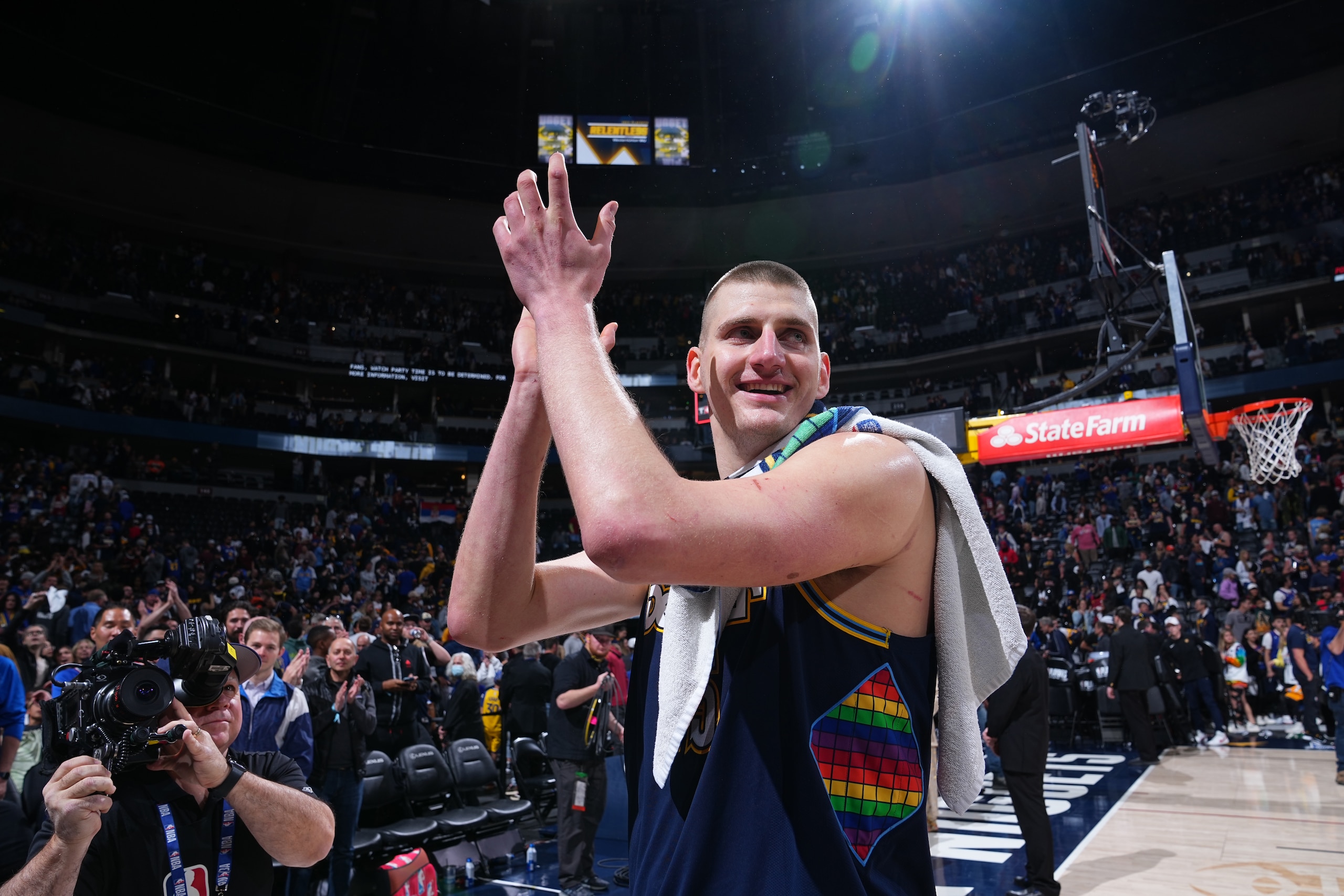 DENVER, CO - APRIL 24: Nikola Jokic #15 of the Denver Nuggets walks off the court after the game against the Golden State Warriors during Round 1 Game 4 of the 2022 NBA Playoffs on April 24, 2022 at the Ball Arena in Denver, Colorado. NOTE TO USER: User expressly acknowledges and agrees that, by downloading and/or using this Photograph, user is consenting to the terms and conditions of the Getty Images License Agreement. Mandatory Copyright Notice: Copyright 2022 NBAE (Photo by Garrett Ellwood/NBAE via Getty Images) DENVER, CO - APRIL 24: Nikola Jokic #15 of the Denver Nuggets walks off the court after the game against the Golden State Warriors during Round 1 Game 4 of the 2022 NBA Playoffs on April 24, 2022 at the Ball Arena in Denver, Colorado. NOTE TO USER: User expressly acknowledges and agrees that, by downloading and/or using this Photograph, user is consenting to the terms and conditions of the Getty Images License Agreement. Mandatory Copyright Notice: Copyright 2022 NBAE (Photo by Garrett Ellwood/NBAE via Getty Images)