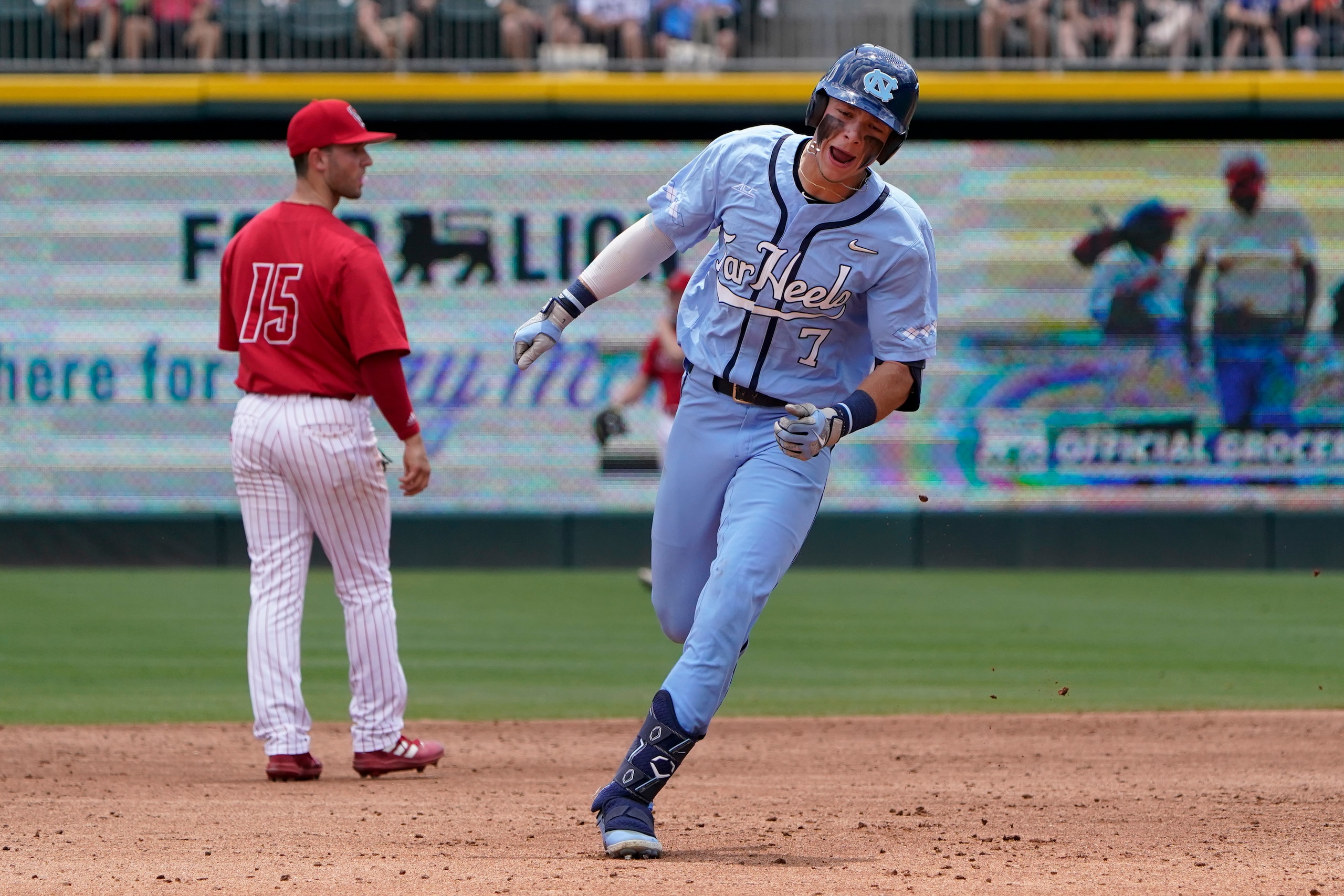 North Carolina's Vance Honeycutt rounds the bases after a three-run home run against the NC State during the second inning in an NCAA college baseball game at the Atlantic Coast Conference tournament final Sunday, May 29, 2022, in Charlotte, N.C. (AP Photo/Chris Carlson)
