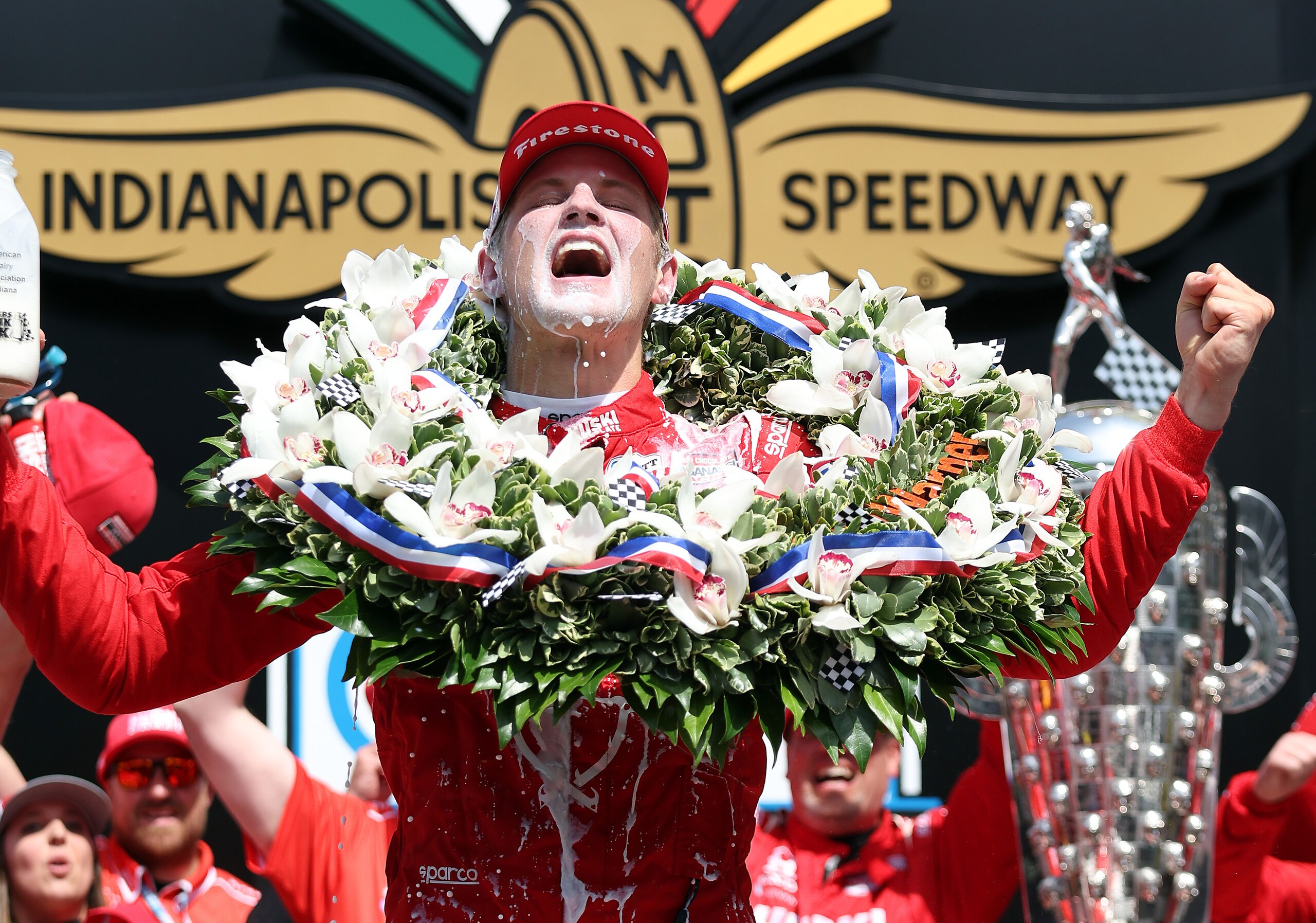 INDIANAPOLIS, INDIANA - MAY 29:  Marcus Ericsson of Sweden, driver of the #5 Chip Ganassi Racing Honda, celebrates in Victory Lane by pouring milk on his head after winning the 106th Running of The Indianapolis 500 at Indianapolis Motor Speedway on May 29, 2022 in Indianapolis, Indiana. (Photo by Jamie Squire/Getty Images)