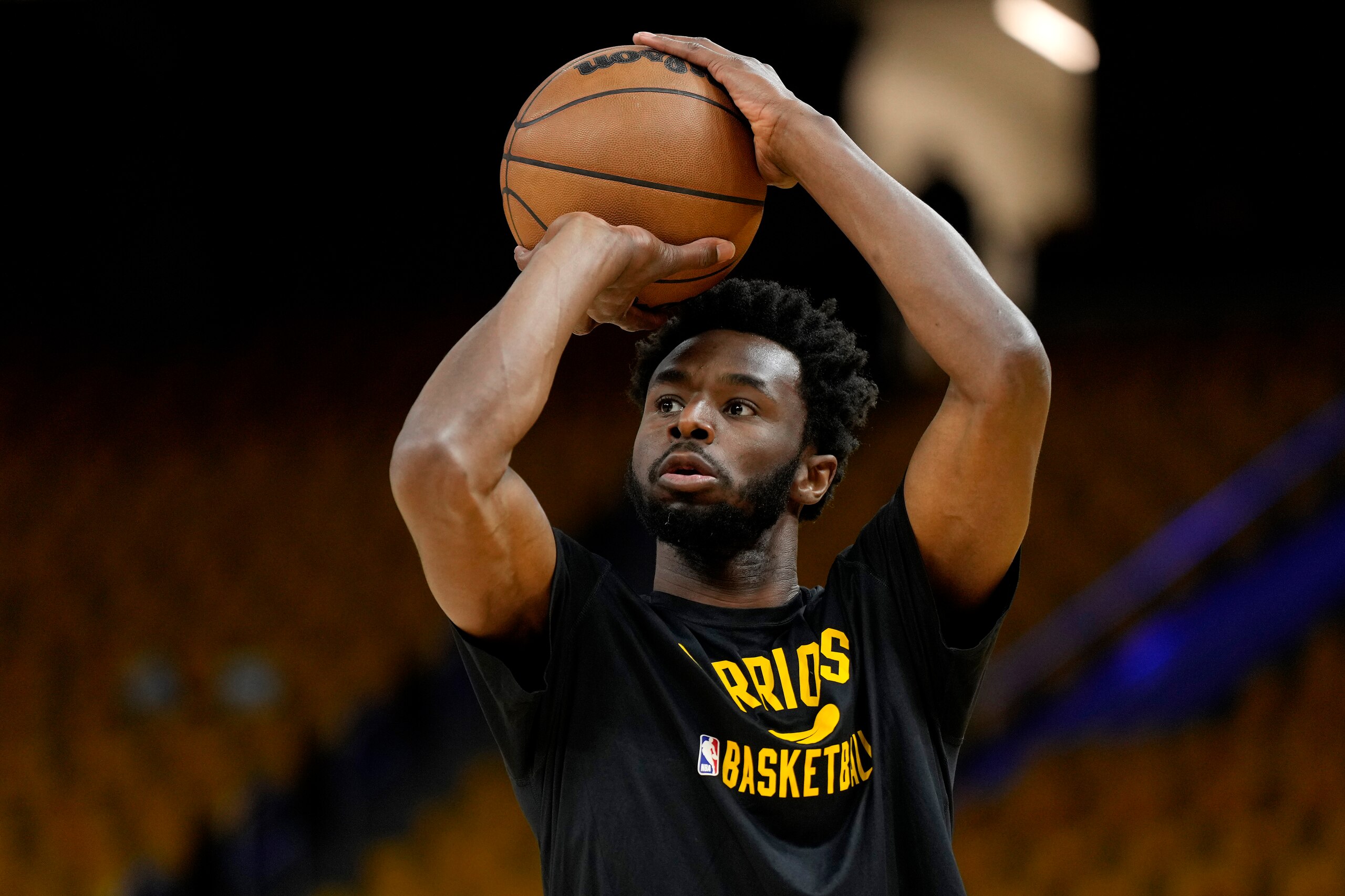 SAN FRANCISCO, CALIFORNIA - MAY 26: Andrew Wiggins #22 of the Golden State Warriors warms up prior to Game Five of the 2022 NBA Playoffs Western Conference Finals against the Dallas Mavericks at Chase Center on May 26, 2022 in San Francisco, California. NOTE TO USER: User expressly acknowledges and agrees that, by downloading and or using this photograph, User is consenting to the terms and conditions of the Getty Images License Agreement. (Photo by Thearon W. Henderson/Getty Images)