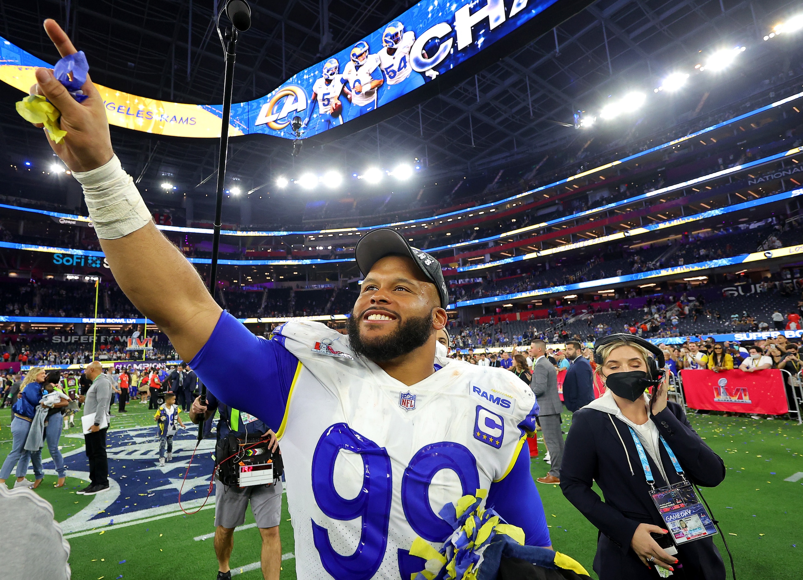 INGLEWOOD, CALIFORNIA - FEBRUARY 13: Aaron Donald #99 of the Los Angeles Rams celebrates after defeating the Cincinnati Bengals during Super Bowl LVI at SoFi Stadium on February 13, 2022 in Inglewood, California. The Los Angeles Rams defeated the Cincinnati Bengals 23-20. (Photo by Kevin C. Cox/Getty Images) INGLEWOOD, CALIFORNIA - FEBRUARY 13: Aaron Donald #99 of the Los Angeles Rams celebrates after defeating the Cincinnati Bengals during Super Bowl LVI at SoFi Stadium on February 13, 2022 in Inglewood, California. The Los Angeles Rams defeated the Cincinnati Bengals 23-20. (Photo by Kevin C. Cox/Getty Images)