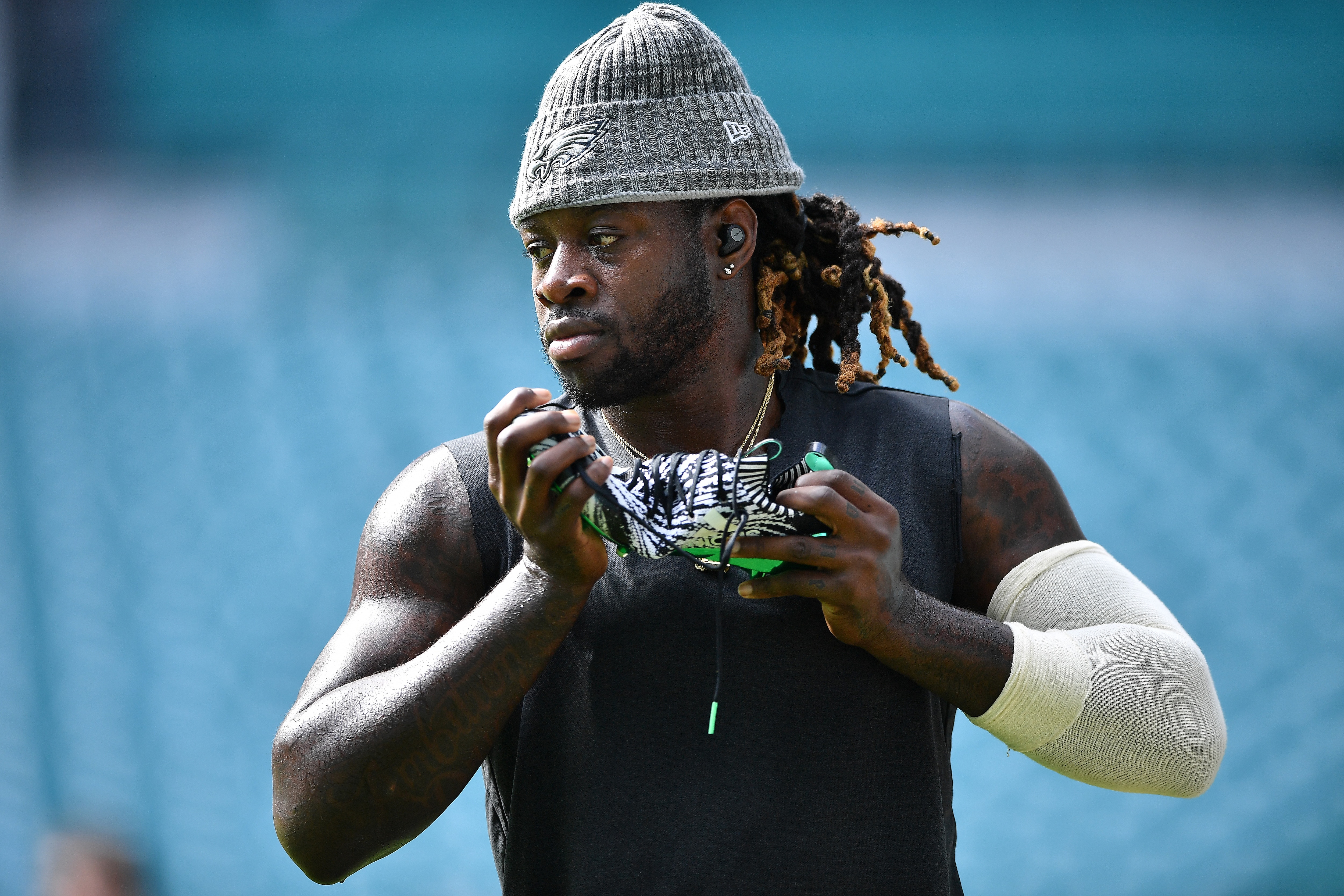 MIAMI, FLORIDA - DECEMBER 01: Jay Ajayi #28 of the Philadelphia Eagles adjusts his Adidas cleat during warm ups prior to the game Miami Dolphins at Hard Rock Stadium on December 01, 2019 in Miami, Florida. (Photo by Mark Brown/Getty Images)
