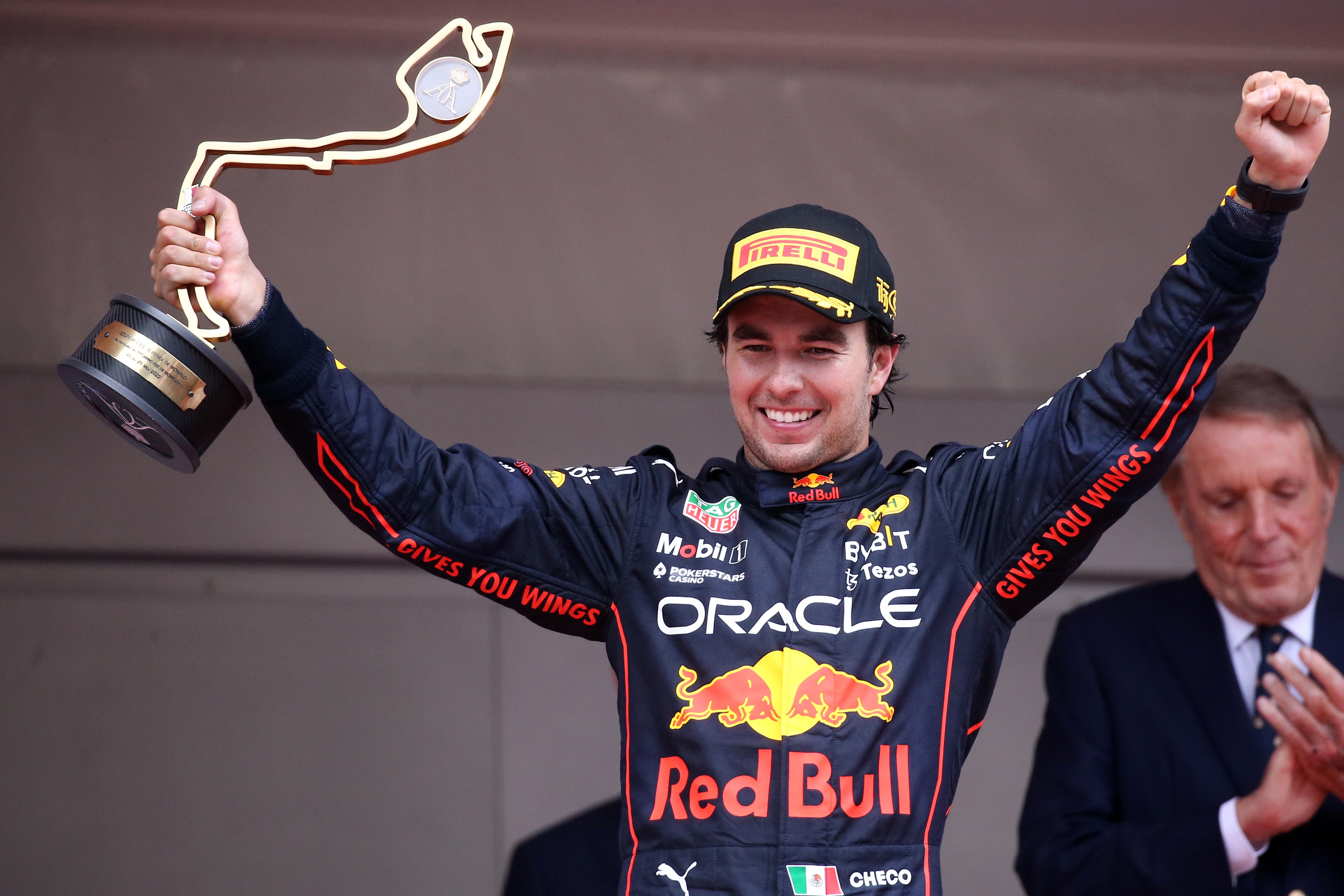 MONTE-CARLO, MONACO - 2022/05/29: Sergio Perez of Red Bull Racing  celebrates on the podium after winning  the F1 Grand Prix of Monaco. (Photo by Marco Canoniero/LightRocket via Getty Images)