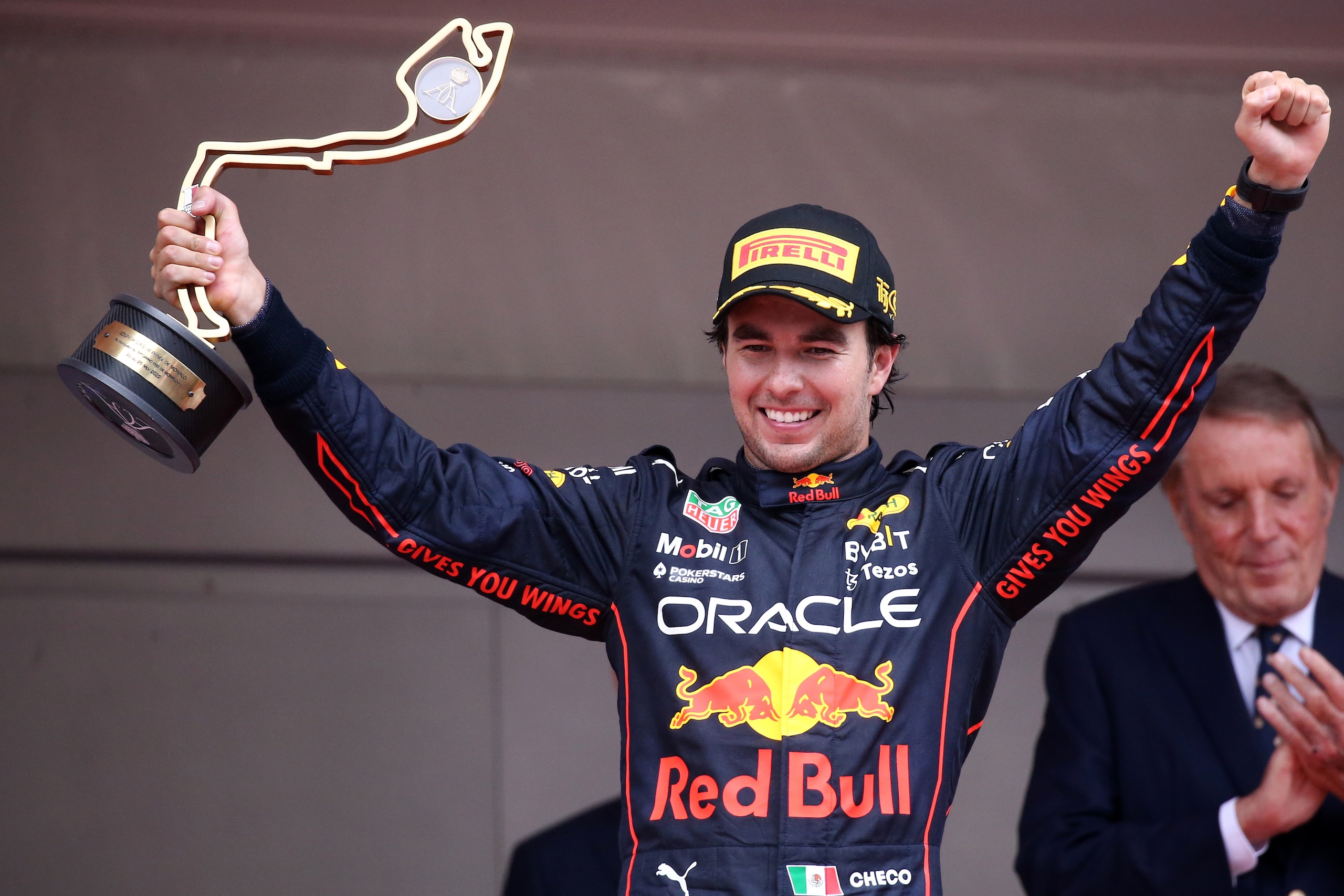 MONTE-CARLO, MONACO - 2022/05/29: Sergio Perez of Red Bull Racing celebrates on the podium after winning the F1 Grand Prix of Monaco. (Photo by Marco Canoniero/LightRocket via Getty Images) MONTE-CARLO, MONACO - 2022/05/29: Sergio Perez of Red Bull Racing celebrates on the podium after winning the F1 Grand Prix of Monaco. (Photo by Marco Canoniero/LightRocket via Getty Images)