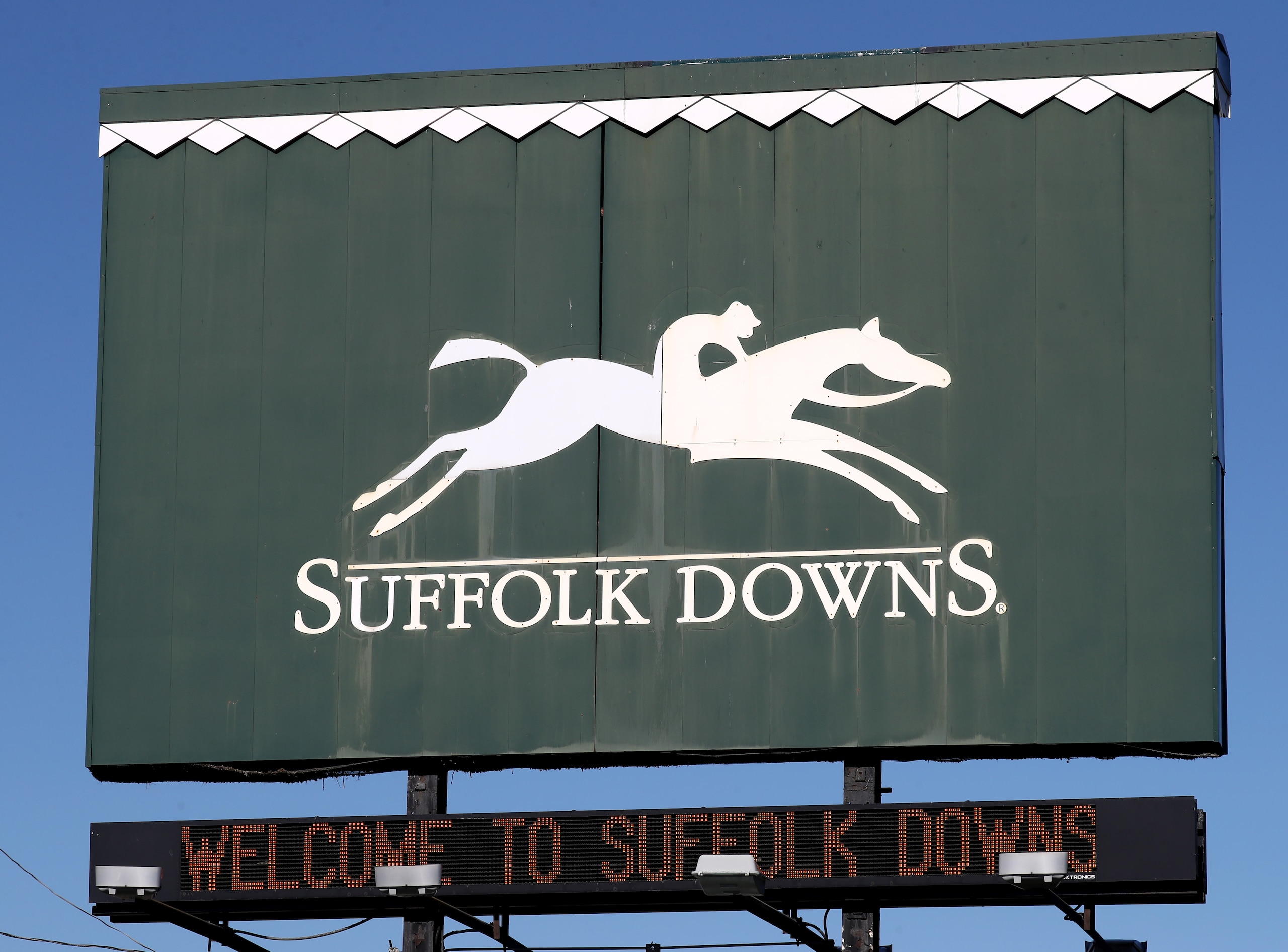 BOSTON, MA - OCTOBER 19: The sign for the shuttered Suffolk Downs horse racing track in Boston is pictured on Oct. 19, 2017. Suffolk Downs is the primary proposed site for Amazons new $5 billion second headquarters" in Boston'd bid for the project. (Photo by David L. Ryan/The Boston Globe via Getty Images) BOSTON, MA - OCTOBER 19: The sign for the shuttered Suffolk Downs horse racing track in Boston is pictured on Oct. 19, 2017. Suffolk Downs is the primary proposed site for Amazons new $5 billion second headquarters" in Boston'd bid for the project. (Photo by David L. Ryan/The Boston Globe via Getty Images)