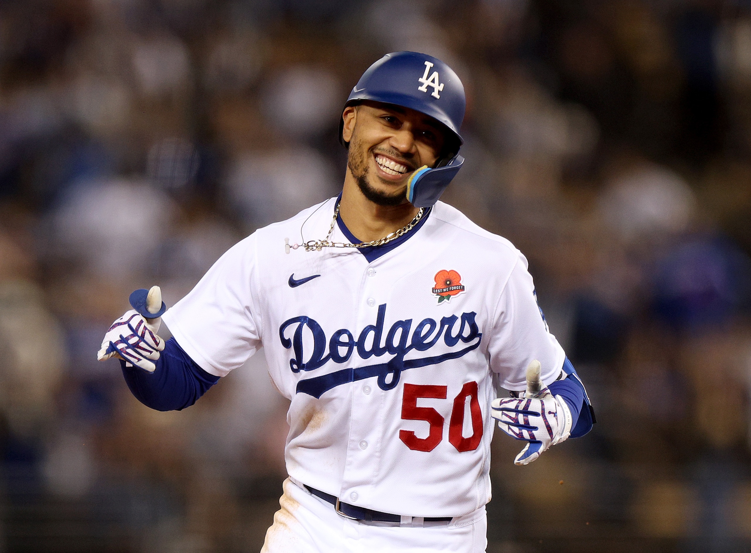 LOS ANGELES, CALIFORNIA - MAY 30: Mookie Betts #50 of the Los Angeles Dodgers celebrates his solo homerun as he runs the bases, to trail 4-2 to the Pittsburgh Pirates, during the fifth inning at Dodger Stadium on May 30, 2022 in Los Angeles, California. (Photo by Harry How/Getty Images)