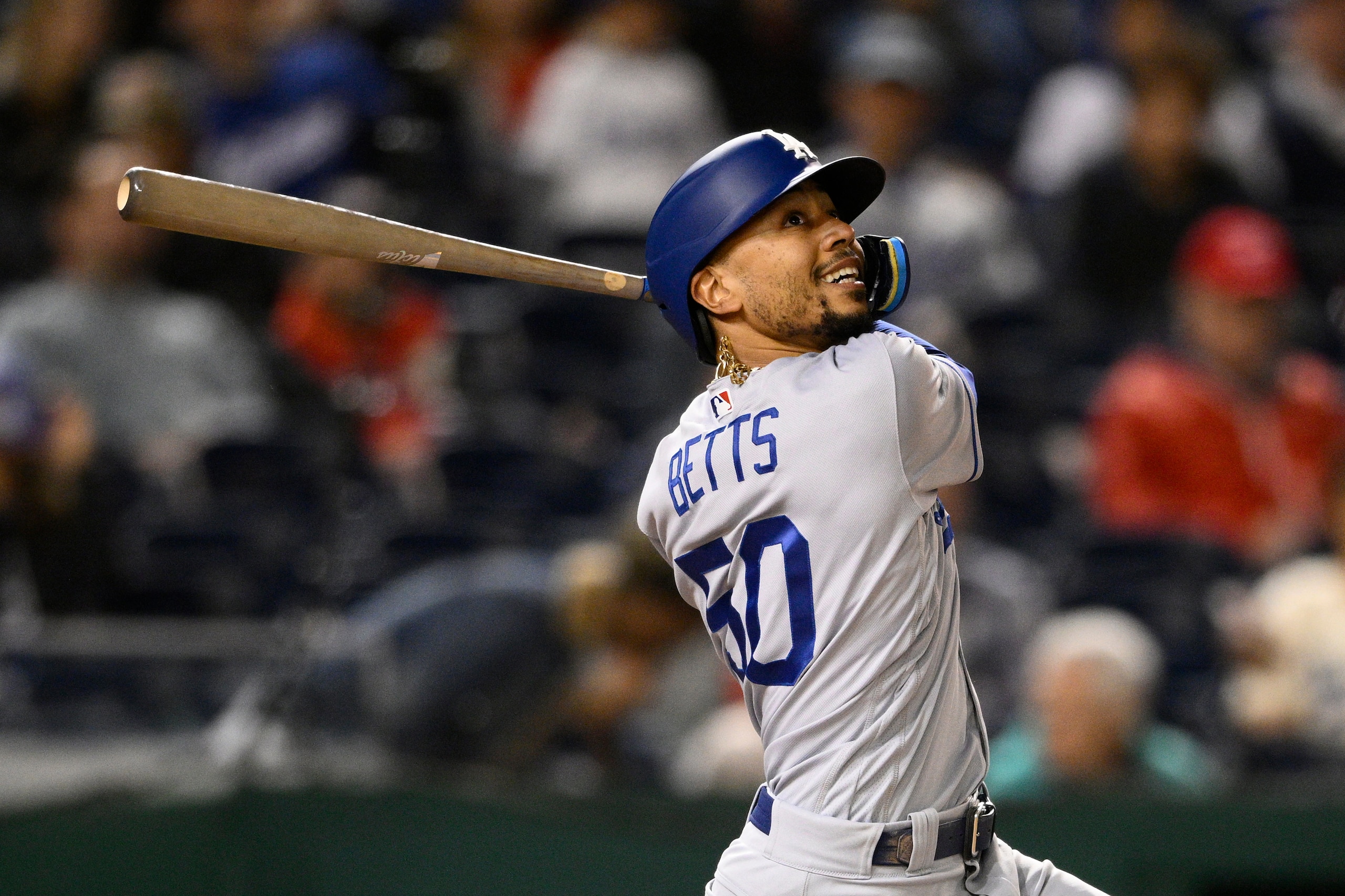 Los Angeles Dodgers' Mookie Betts in action during a baseball game against the Washington Nationals, Tuesday, May 24, 2022, in Washington. The Dodgers won 9-4. (AP Photo/Nick Wass)