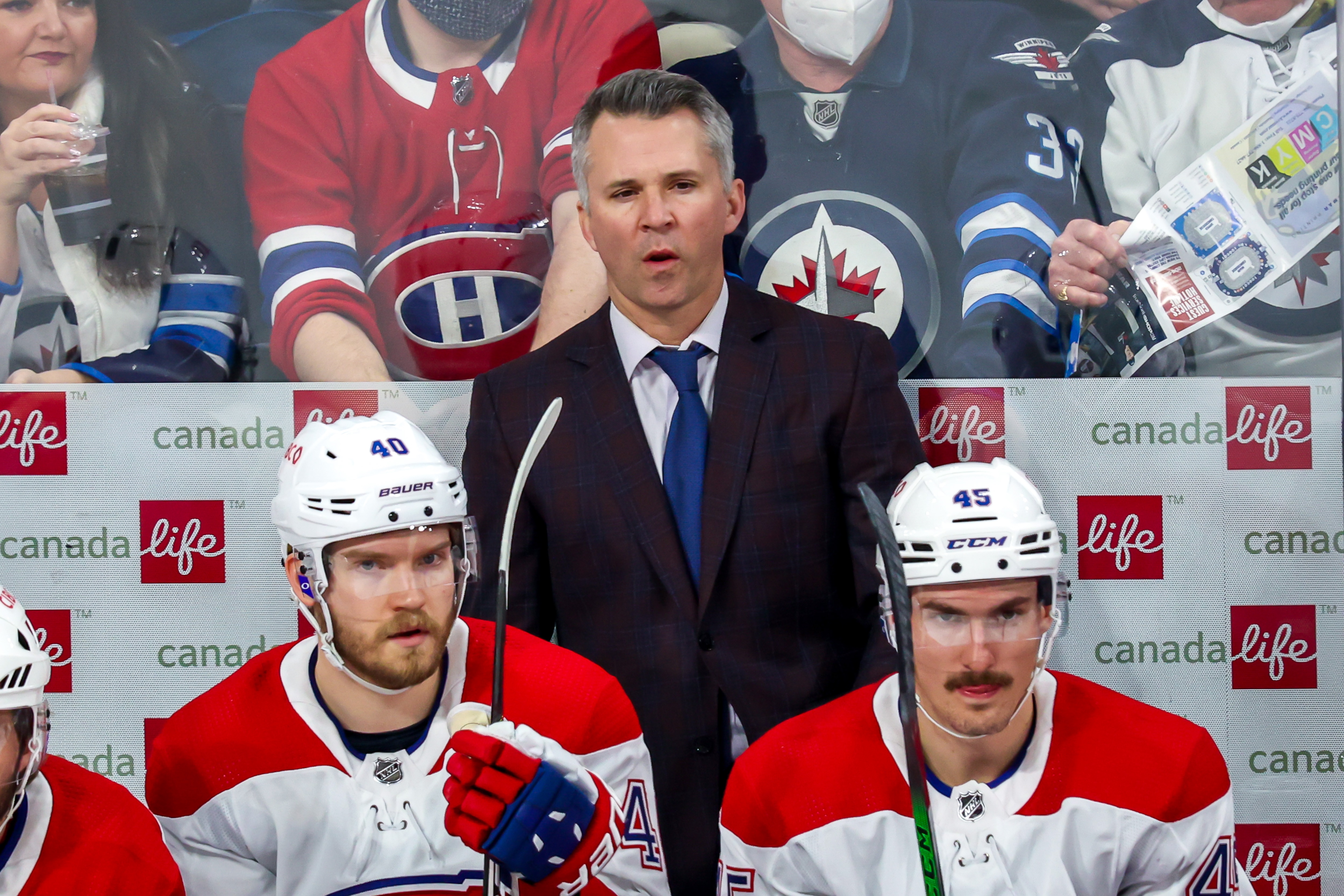 WINNIPEG, MB - MARCH 01: Interim head coach Martin St-Louis of the Montreal Canadiens looks on from the bench during first period action against the Winnipeg Jets at Canada Life Centre on March 01, 2022 in Winnipeg, Manitoba, Canada. (Photo by Jonathan Kozub/NHLI via Getty Images)