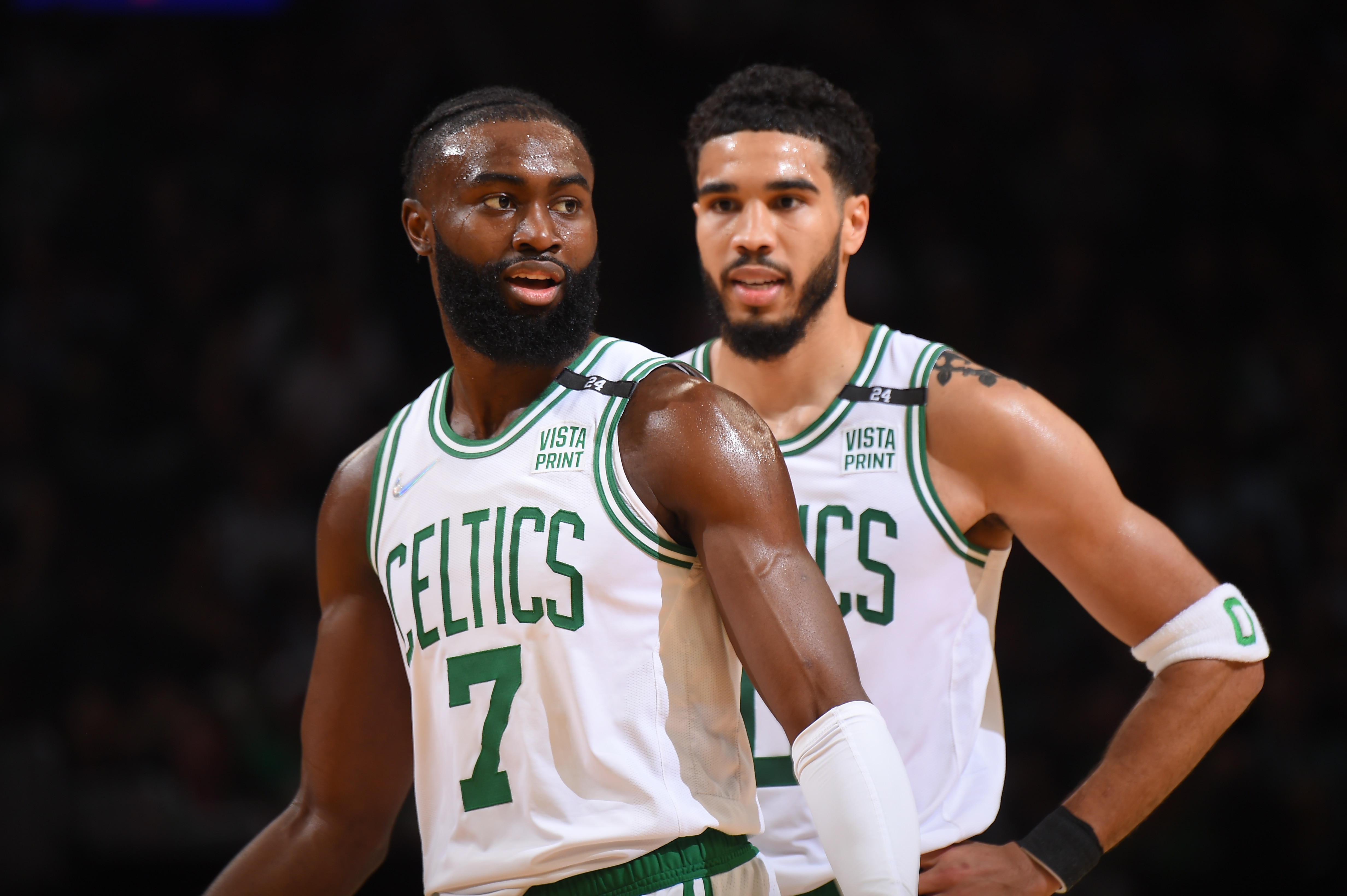 BOSTON, MA - MAY 23: Jaylen Brown #7 of the Boston Celtics and Jayson Tatum #0 look on during Game 4 of the 2022 NBA Playoffs Eastern Conference Finals on May 23, 2022 at the TD Garden in Boston, Massachusetts.  NOTE TO USER: User expressly acknowledges and agrees that, by downloading and or using this photograph, User is consenting to the terms and conditions of the Getty Images License Agreement. Mandatory Copyright Notice: Copyright 2022 NBAE  (Photo by Brian Babineau/NBAE via Getty Images)