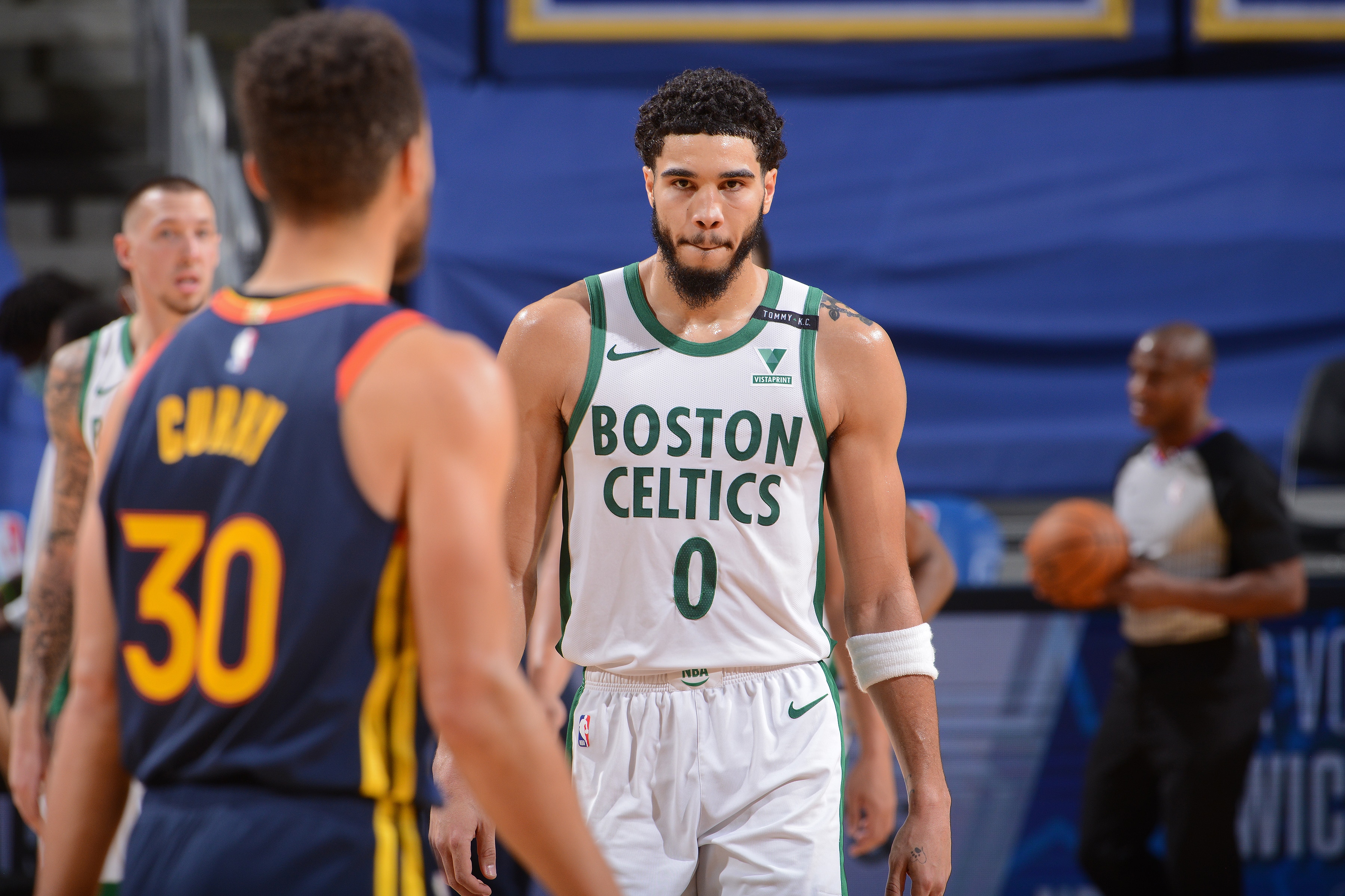 SAN FRANCISCO, CA - FEBRUARY 2: Stephen Curry #30 of the Golden State Warriors and Jayson Tatum #0 of the Boston Celtics look on during the game on February 2, 2021 at Chase Center in San Francisco, California. NOTE TO USER: User expressly acknowledges and agrees that, by downloading and or using this photograph, user is consenting to the terms and conditions of Getty Images License Agreement. Mandatory Copyright Notice: Copyright 2021 NBAE (Photo by Noah Graham/NBAE via Getty Images)