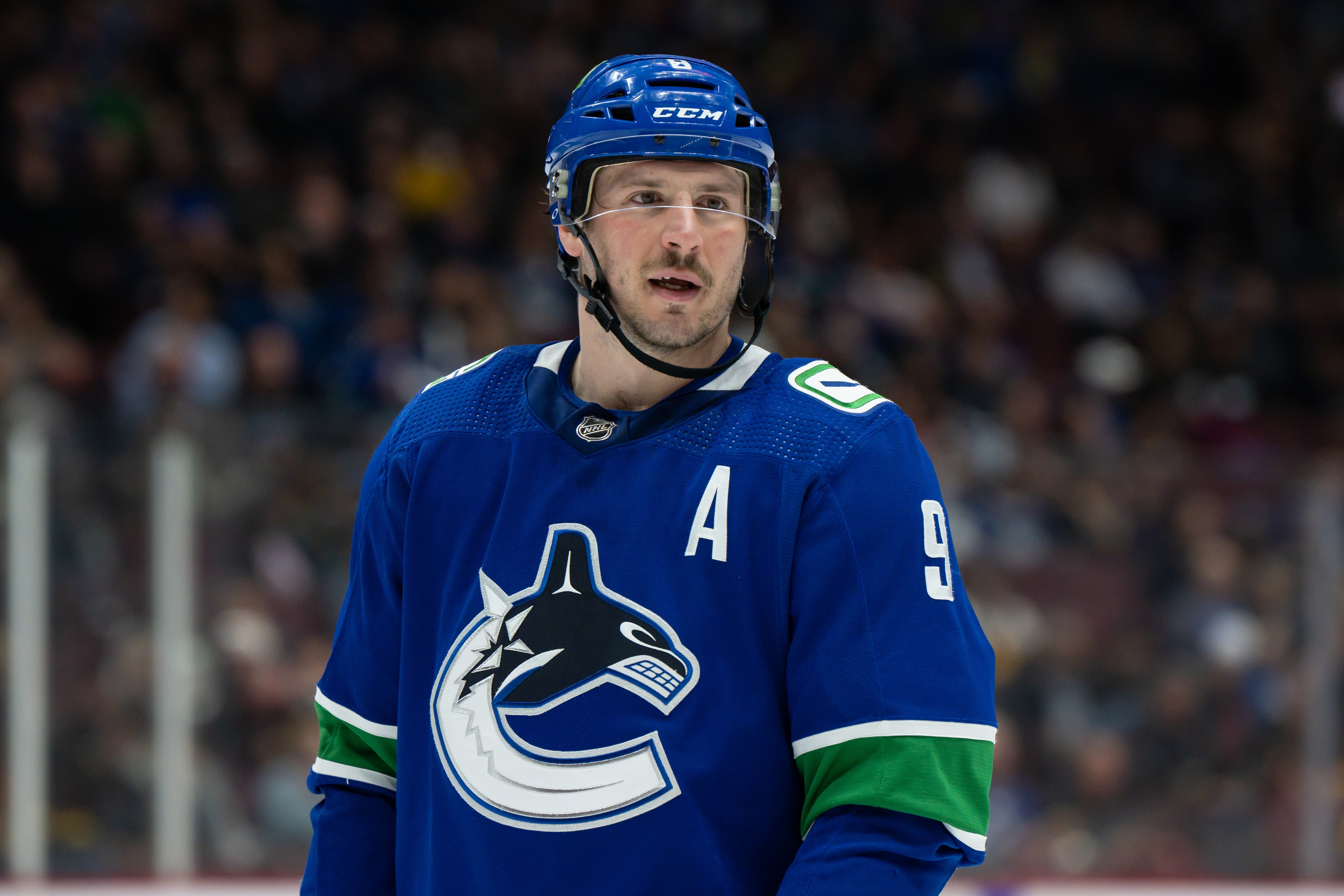 VANCOUVER, BC - APRIL 19: Vancouver Canucks center J.T. Miller (9) waits for a face-off during their NHL game against the Ottawa Senators at Rogers Arena on April 19, 2022 in Vancouver, British Columbia, Canada. (Photo by Derek Cain/Icon Sportswire via Getty Images)