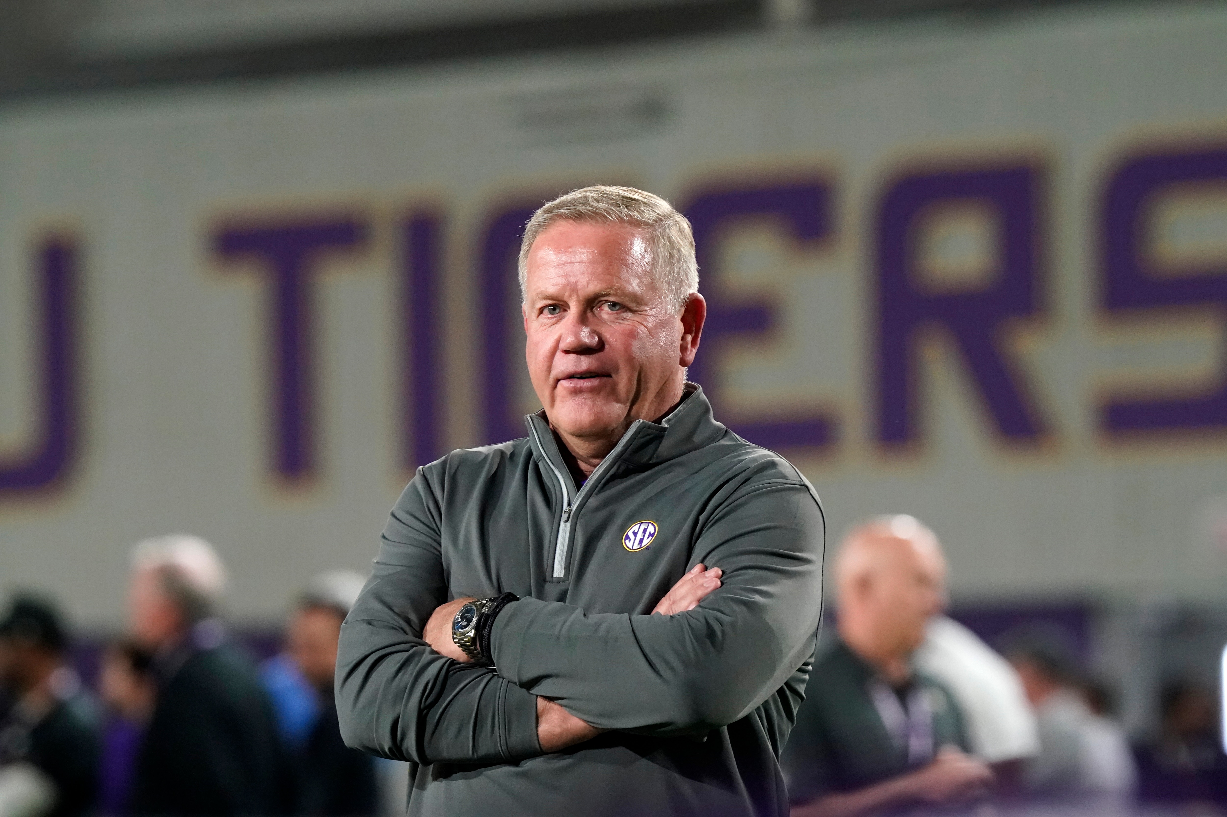 LSU head coach Brian Kelly walks on the field during LSU Pro Day in Baton Rouge, La., Wednesday, April 6, 2022. (AP Photo/Gerald Herbert)