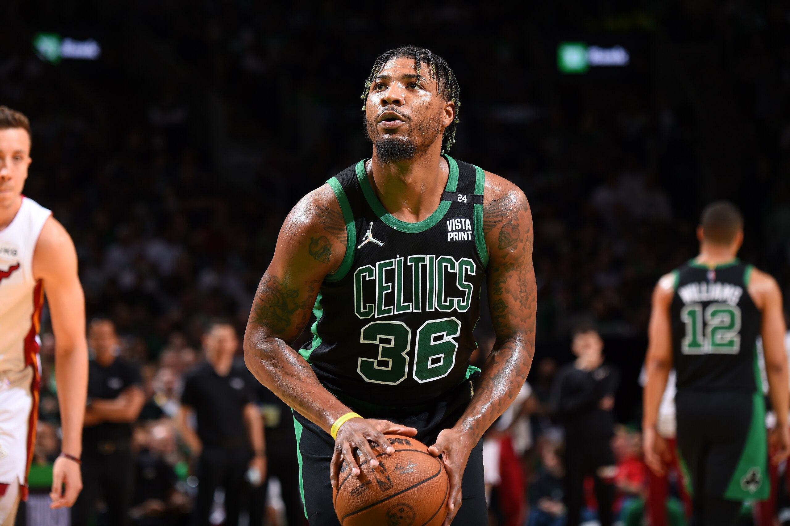 BOSTON, MA - MAY 27: Marcus Smart #36 of the Boston Celtics prepares to shoot a free throw during Game 6 of the 2022 NBA Playoffs Eastern Conference Finals against the Miami Heat on May 27, 2022 at the TD Garden in Boston, Massachusetts.  NOTE TO USER: User expressly acknowledges and agrees that, by downloading and or using this photograph, User is consenting to the terms and conditions of the Getty Images License Agreement. Mandatory Copyright Notice: Copyright 2022 NBAE  (Photo by Brian Babineau/NBAE via Getty Images)