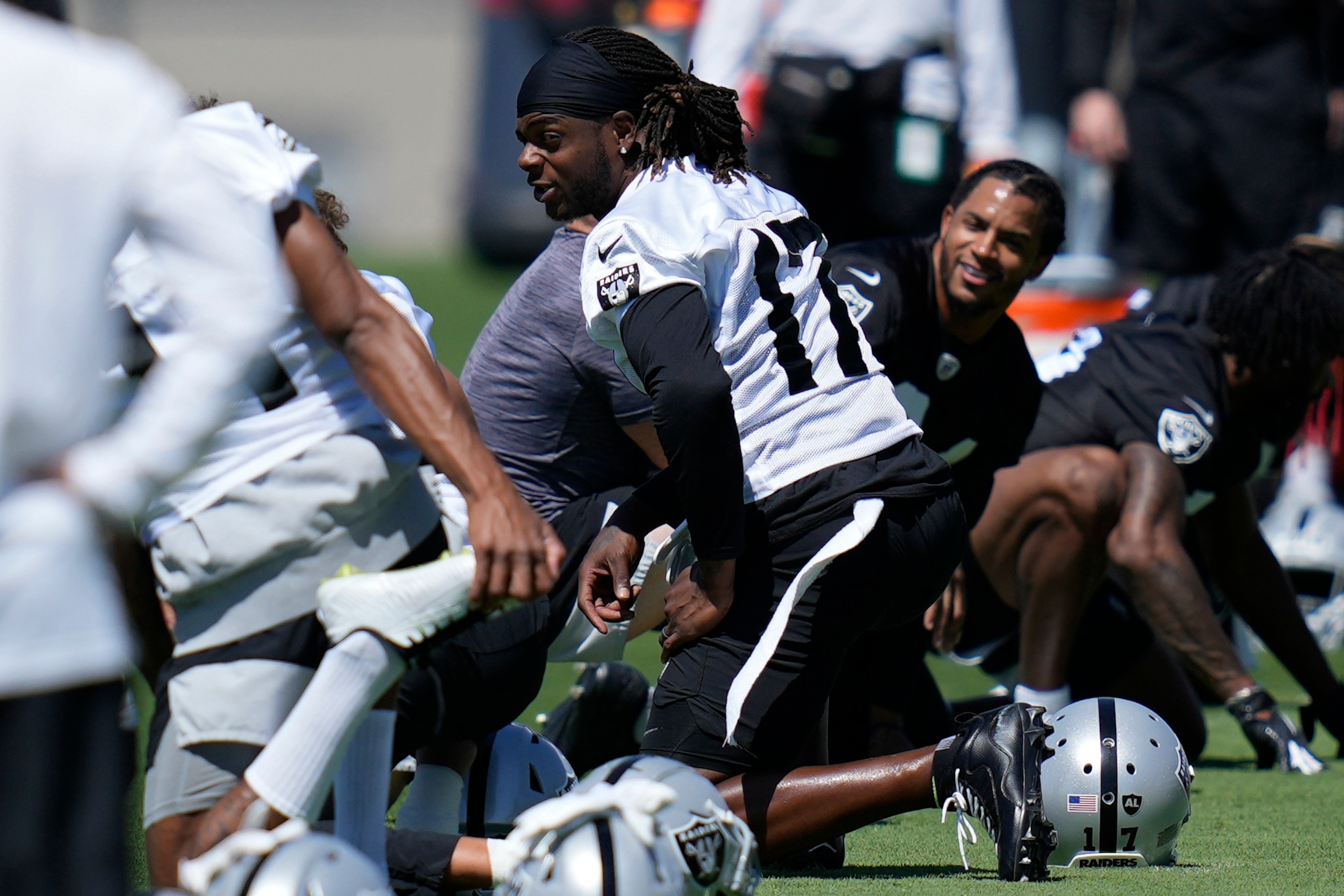 Raiders wide receiver Davante Adams warms up during practice at the NFL football team's practice facility Thursday, May 26, 2022, in Henderson, Nev. (AP Photo/John Locher) Raiders wide receiver Davante Adams warms up during practice at the NFL football team's practice facility Thursday, May 26, 2022, in Henderson, Nev. (AP Photo/John Locher)