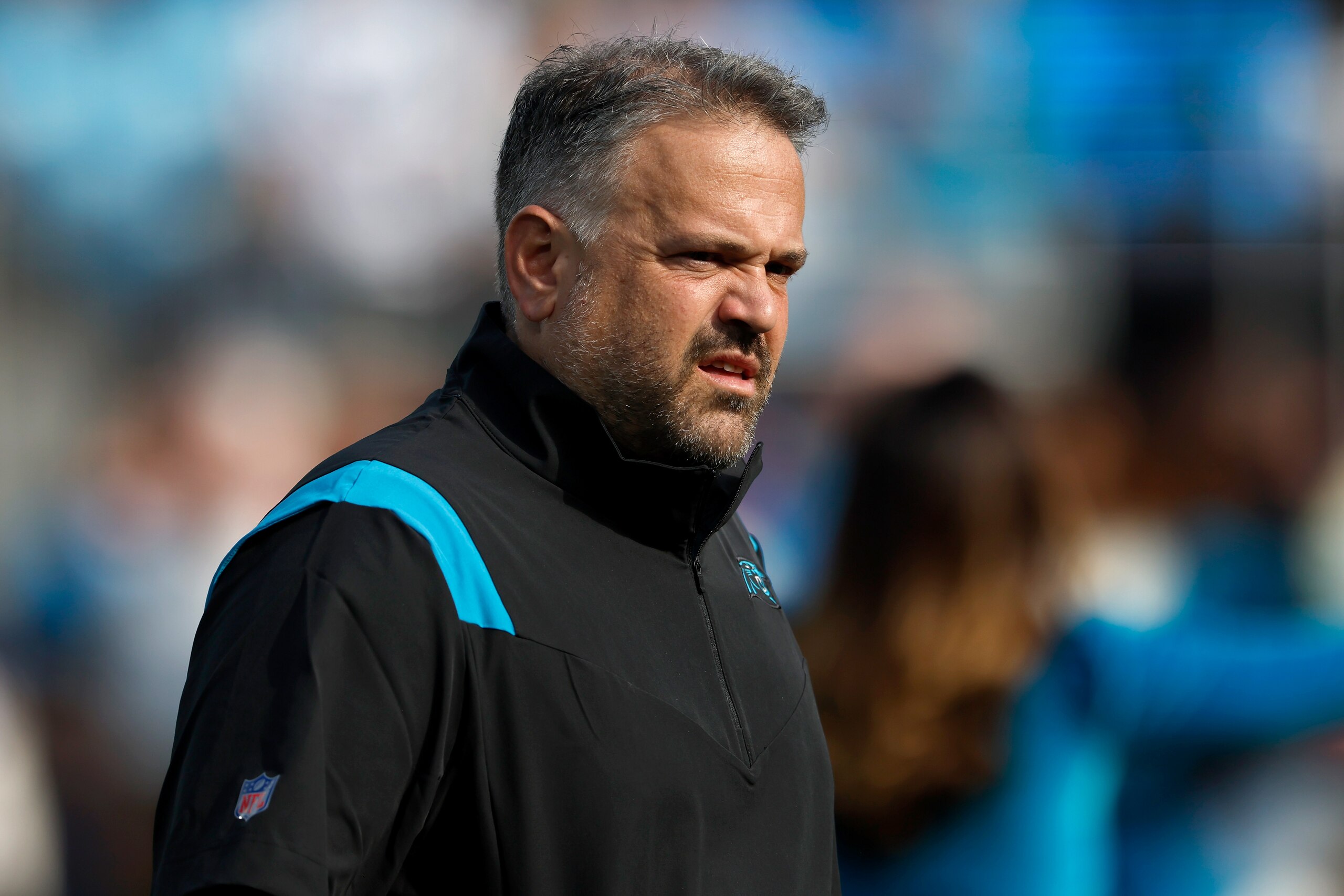 CHARLOTTE, NORTH CAROLINA - DECEMBER 26: Head coach Matt Rhule of the Carolina Panthers walks onto the field before the game against the Tampa Bay Buccaneers at Bank of America Stadium on December 26, 2021 in Charlotte, North Carolina. (Photo by Grant Halverson/Getty Images) CHARLOTTE, NORTH CAROLINA - DECEMBER 26: Head coach Matt Rhule of the Carolina Panthers walks onto the field before the game against the Tampa Bay Buccaneers at Bank of America Stadium on December 26, 2021 in Charlotte, North Carolina. (Photo by Grant Halverson/Getty Images)