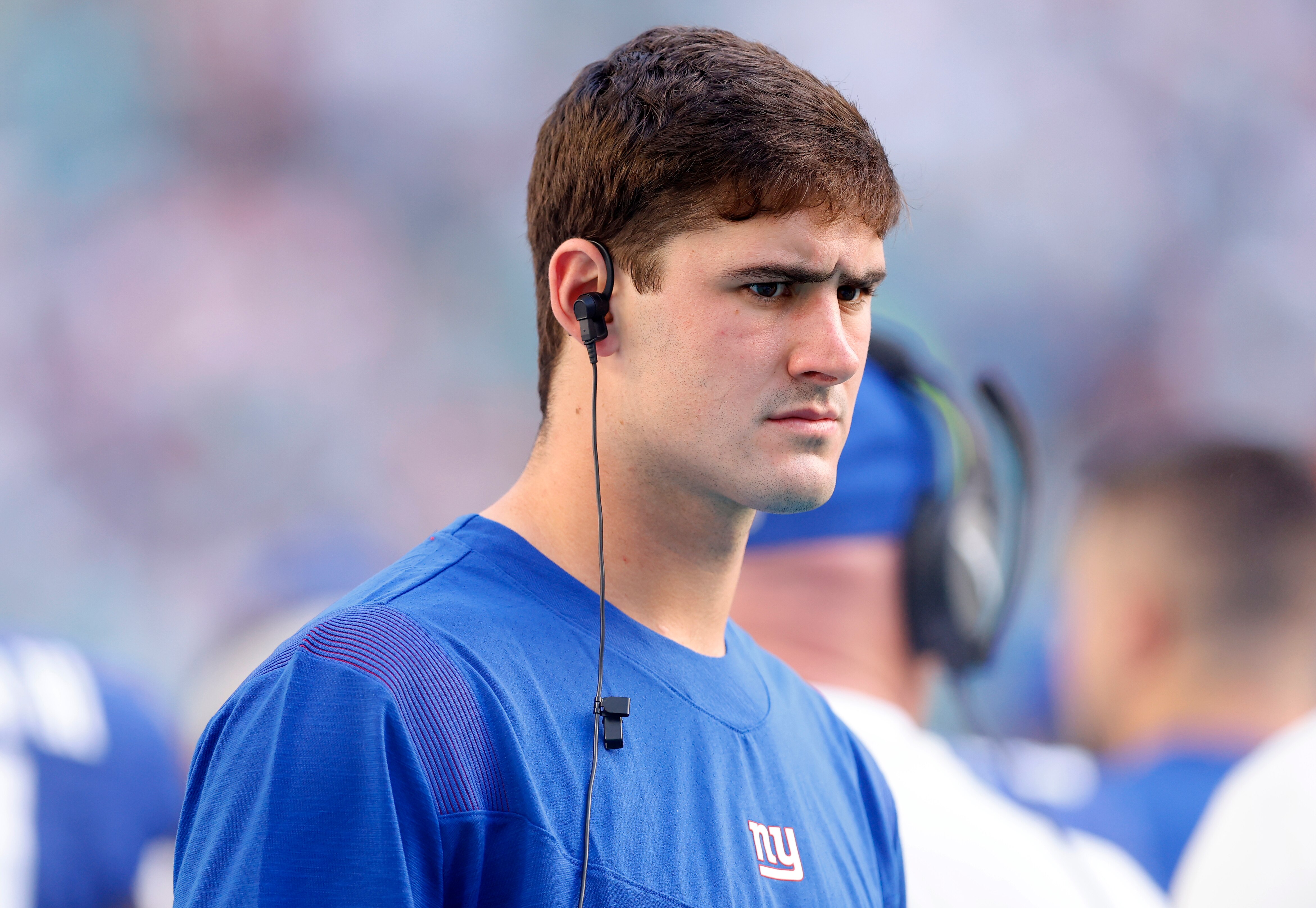 MIAMI GARDENS, FLORIDA - DECEMBER 05: Daniel Jones #8 of the New York Giants looks on from the side line during the game against the Miami Dolphins at Hard Rock Stadium on December 05, 2021 in Miami Gardens, Florida. Jones is ruled out for today's game with an injury. (Photo by Michael Reaves/Getty Images)