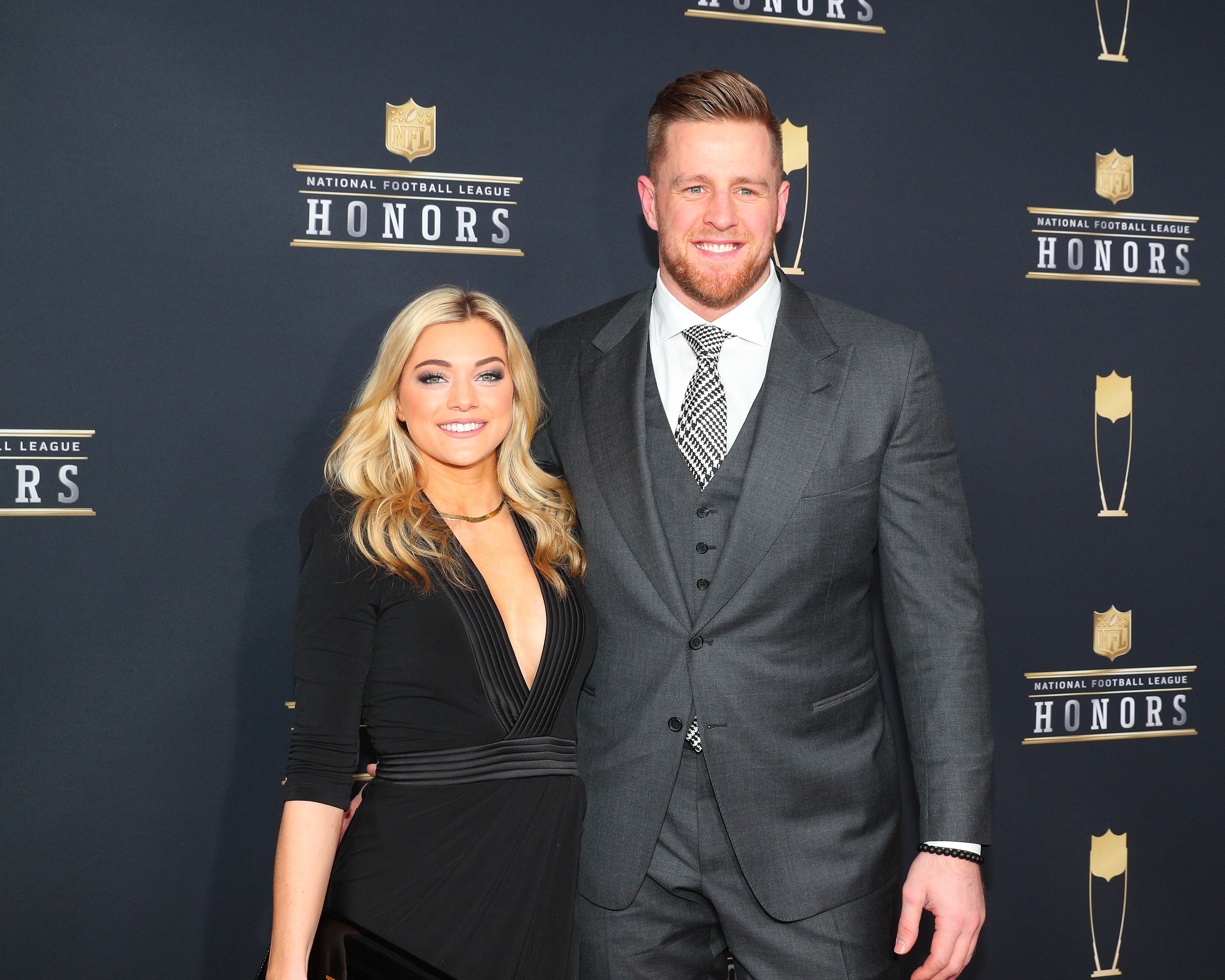 MINNEAPOLIS, MN - FEBRUARY 03:  JJ Watt and girlfriend Kealia Ohai pose for Photographs on the Red Carpet at NFL Honors during Super Bowl LII week on February 3, 2018, at Northrop at the University of Minnesota in Minneapolis, MN.  (Photo by Rich Graessle/Icon Sportswire via Getty Images)