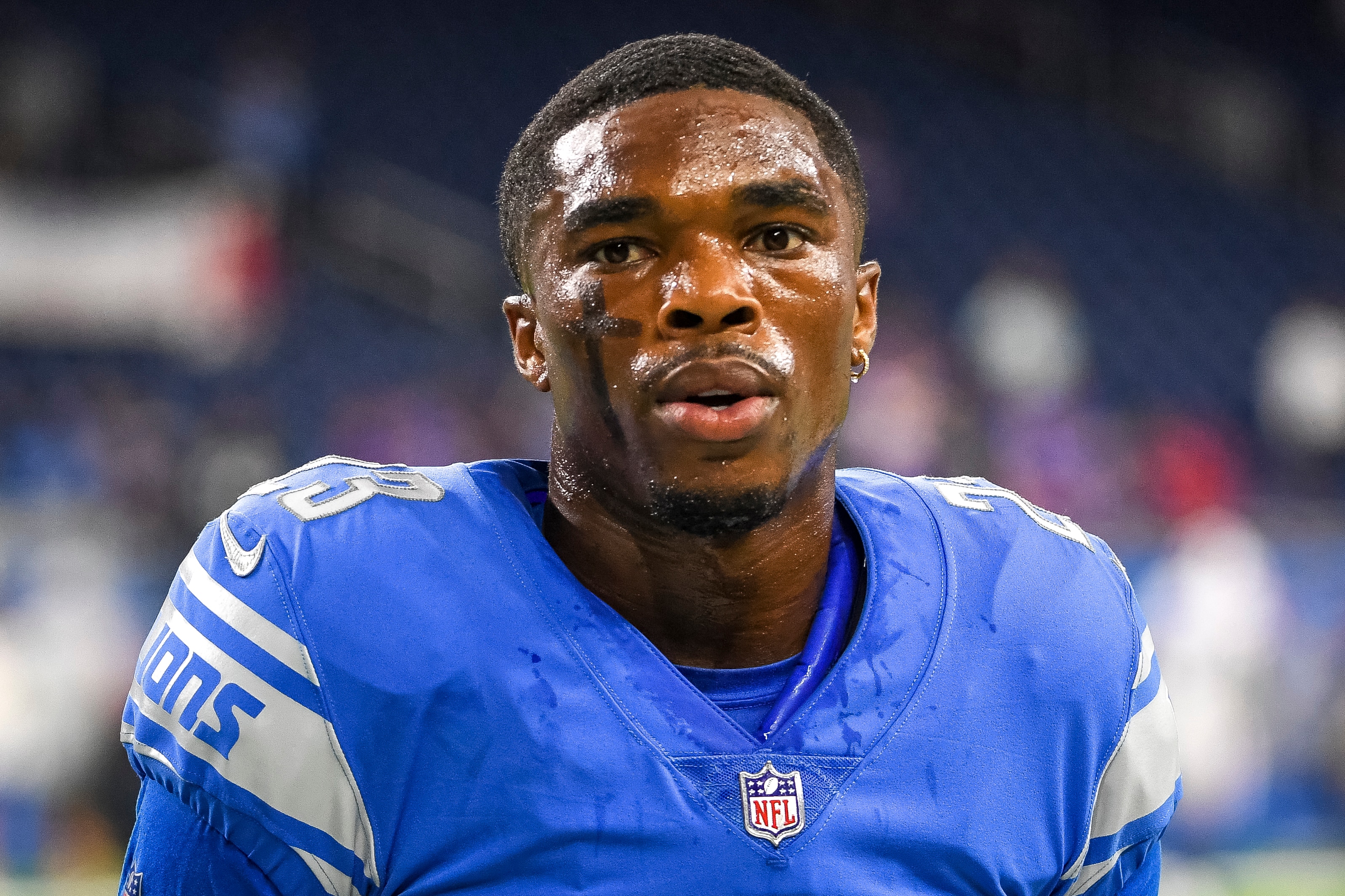 DETROIT, MICHIGAN - AUGUST 13: Jeff Okudah #23 of the Detroit Lions looks on before the preseason game against the Buffalo Bills at Ford Field on August 13, 2021 in Detroit, Michigan. (Photo by Nic Antaya/Getty Images)