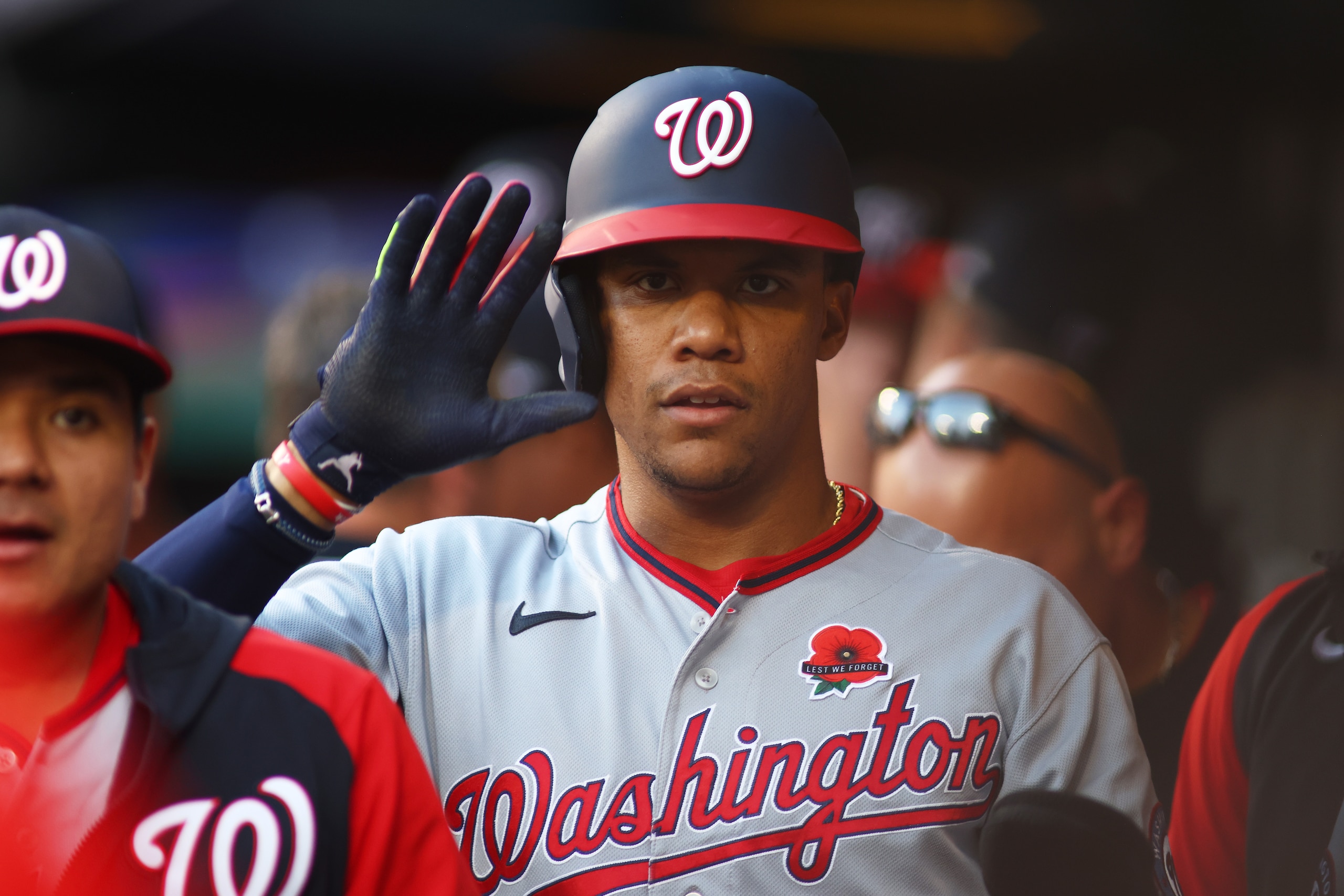 NEW YORK, NEW YORK - MAY 30: Juan Soto #22 of the Washington Nationals celebrates after scoring on Josh Bell #19 2-run single in the first inning against the New York Mets at Citi Field on May 30, 2022 in New York City. (Photo by Mike Stobe/Getty Images)
