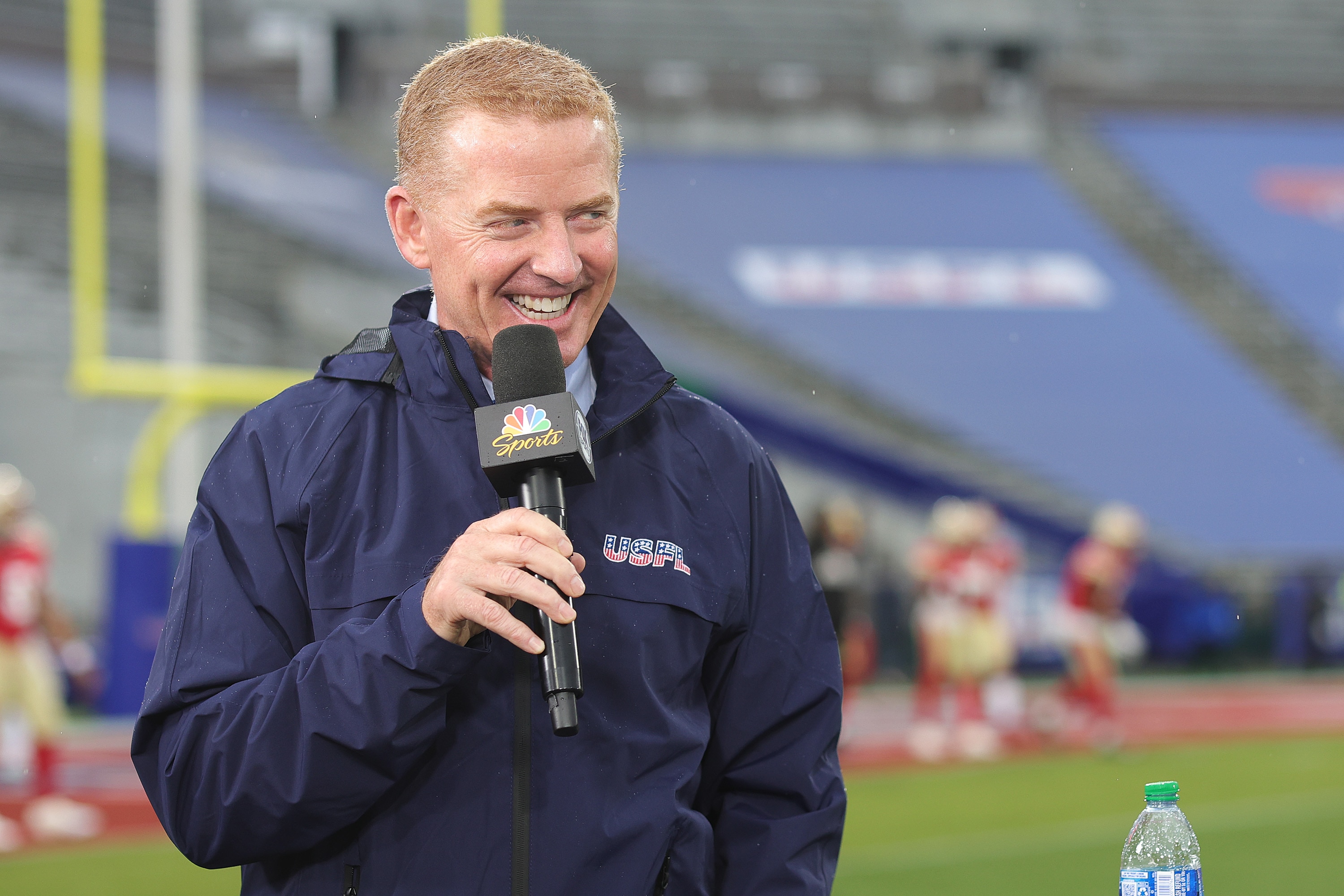 BIRMINGHAM, ALABAMA - APRIL 16: NBC Sports broadcaster Jason Garrett talks on the sideline before the game between the New Jersey Generals and the Birmingham Stallions at Protective Stadium on April 16, 2022 in Birmingham, Alabama. (Photo by Carmen Mandato/USFL/Getty Images)