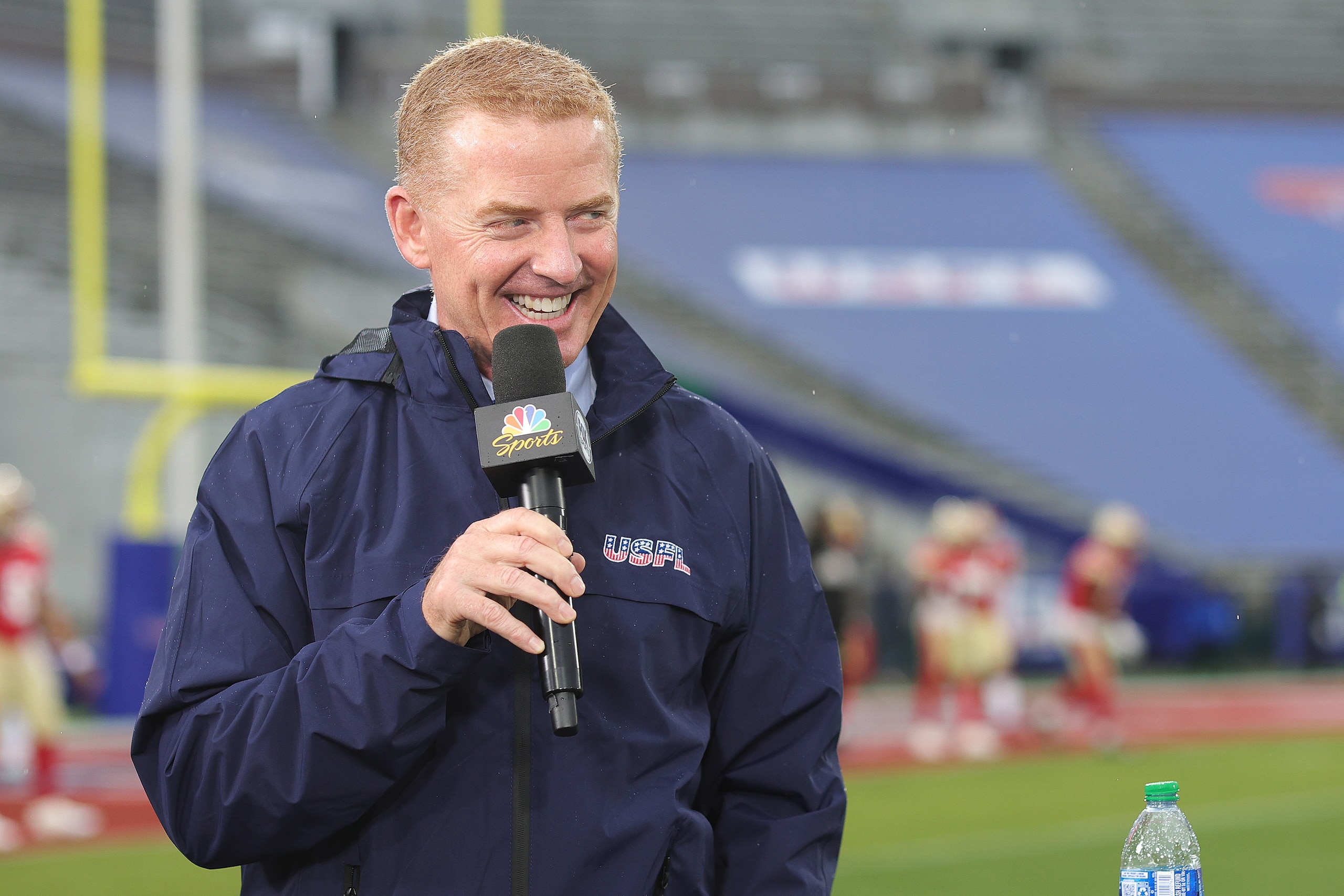 BIRMINGHAM, ALABAMA - APRIL 16: NBC Sports broadcaster Jason Garrett talks on the sideline before the game between the New Jersey Generals and the Birmingham Stallions at Protective Stadium on April 16, 2022 in Birmingham, Alabama. (Photo by Carmen Mandato/USFL/Getty Images) BIRMINGHAM, ALABAMA - APRIL 16: NBC Sports broadcaster Jason Garrett talks on the sideline before the game between the New Jersey Generals and the Birmingham Stallions at Protective Stadium on April 16, 2022 in Birmingham, Alabama. (Photo by Carmen Mandato/USFL/Getty Images)