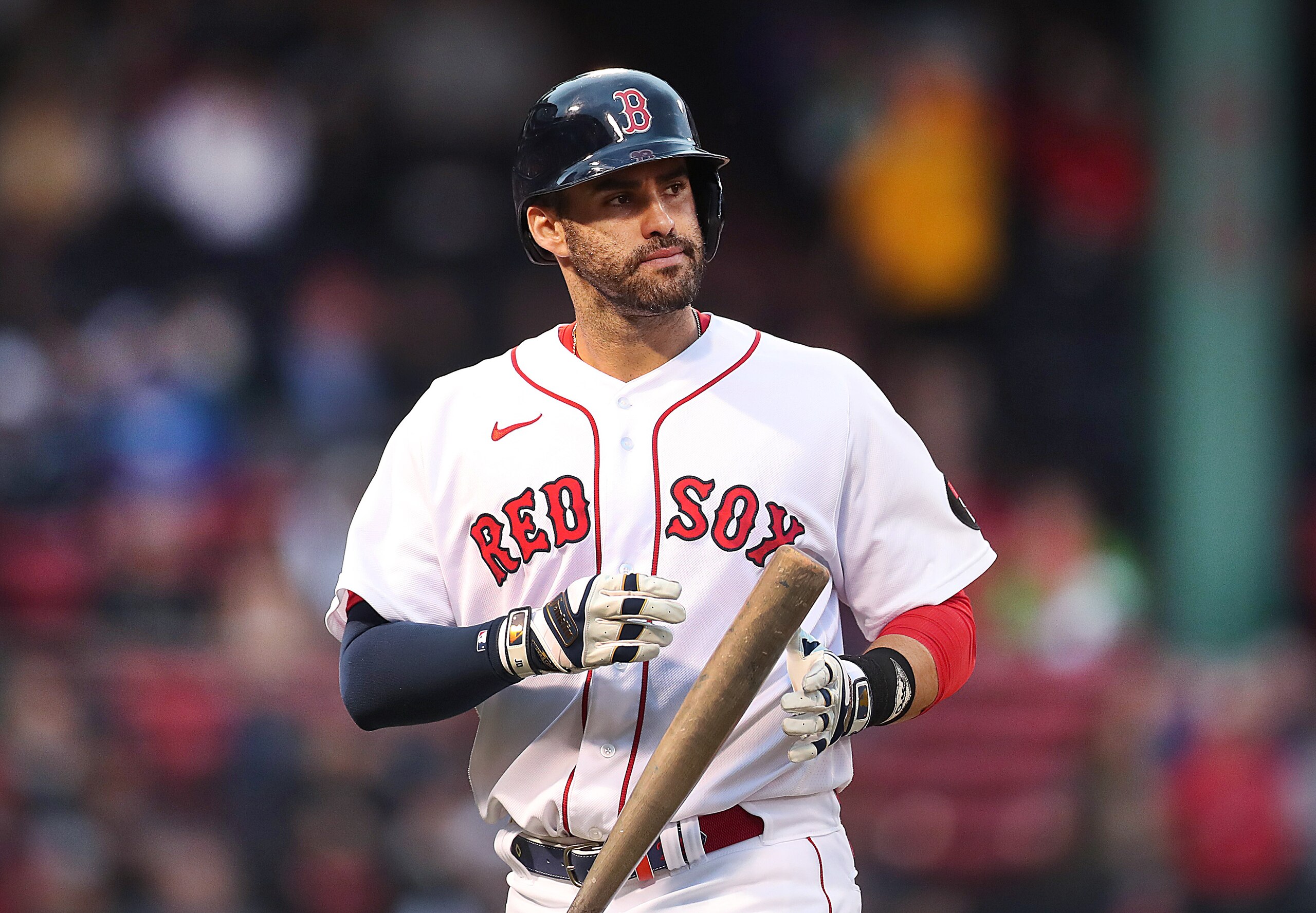 Boston - May 19: Boston Red Sox left fielder J.D. Martinez (28) walks to the dugout after flying out in the 1st inning. The Boston Red Sox host the Seattle Mariners in an MLB game at Fenway Park in Boston on May 19, 2022. (Photo by John Tlumacki/The Boston Globe via Getty Images)