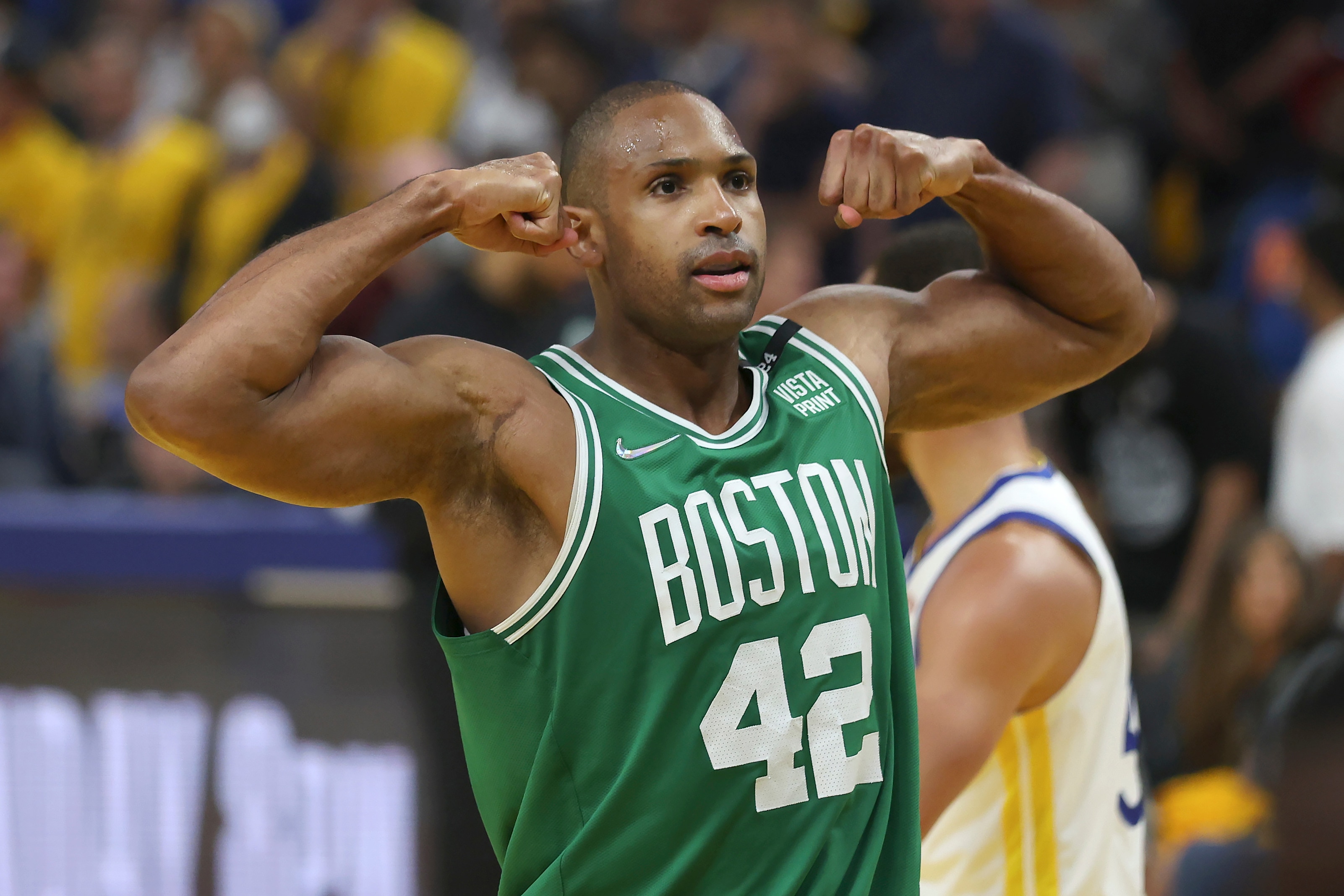 Boston Celtics center Al Horford (42) celebrates during the second half of Game 1 of basketball's NBA Finals against the Golden State Warriors in San Francisco, Thursday, June 2, 2022. (AP Photo/Jed Jacobsohn)