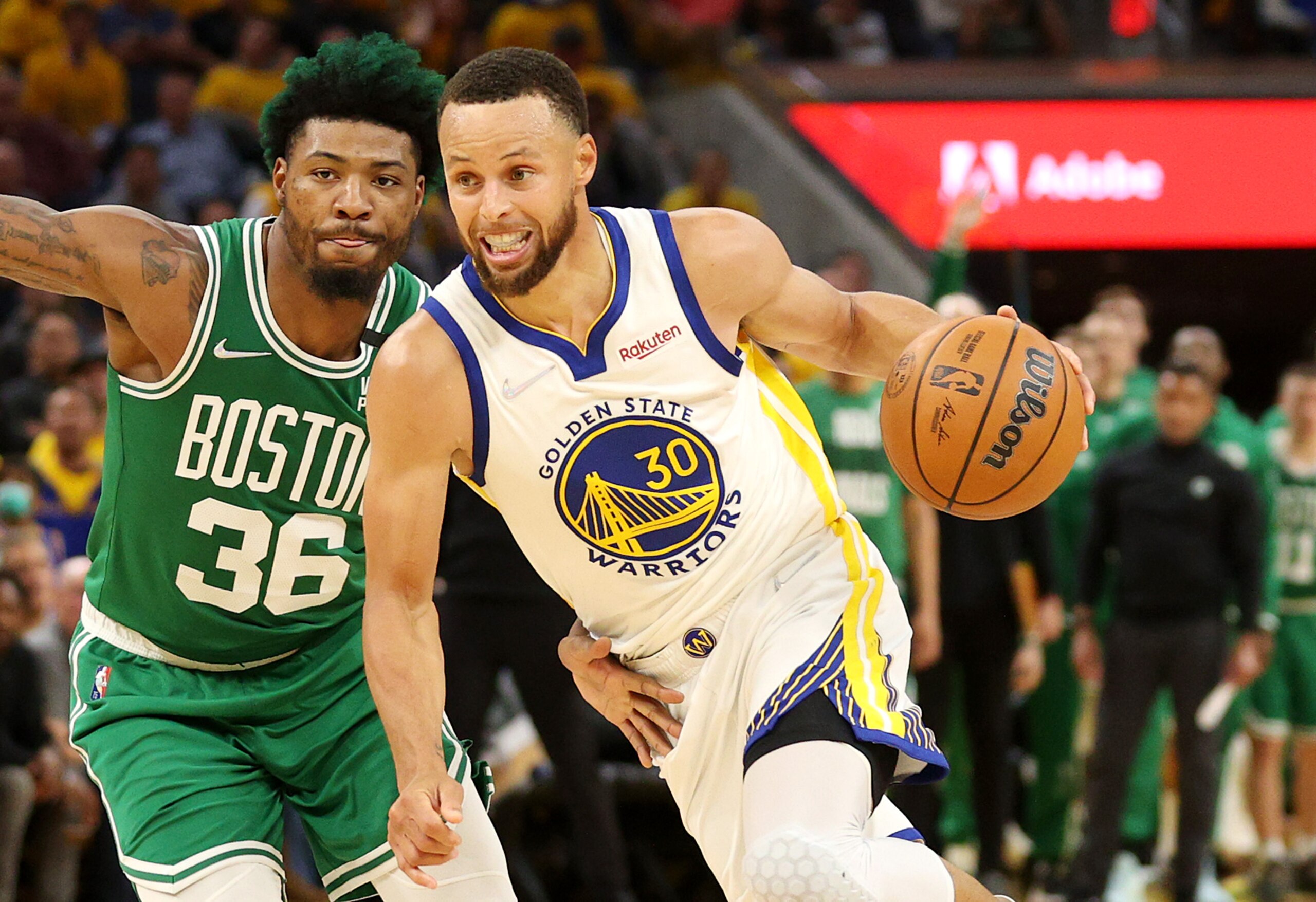 SAN FRANCISCO, CALIFORNIA - JUNE 02: Stephen Curry #30 of the Golden State Warriors dribbles against Marcus Smart #36 of the Boston Celtics during the fourth quarter in Game One of the 2022 NBA Finals at Chase Center on June 02, 2022 in San Francisco, California. NOTE TO USER: User expressly acknowledges and agrees that, by downloading and/or using this photograph, User is consenting to the terms and conditions of the Getty Images License Agreement. (Photo by Ezra Shaw/Getty Images) SAN FRANCISCO, CALIFORNIA - JUNE 02: Stephen Curry #30 of the Golden State Warriors dribbles against Marcus Smart #36 of the Boston Celtics during the fourth quarter in Game One of the 2022 NBA Finals at Chase Center on June 02, 2022 in San Francisco, California. NOTE TO USER: User expressly acknowledges and agrees that, by downloading and/or using this photograph, User is consenting to the terms and conditions of the Getty Images License Agreement. (Photo by Ezra Shaw/Getty Images)