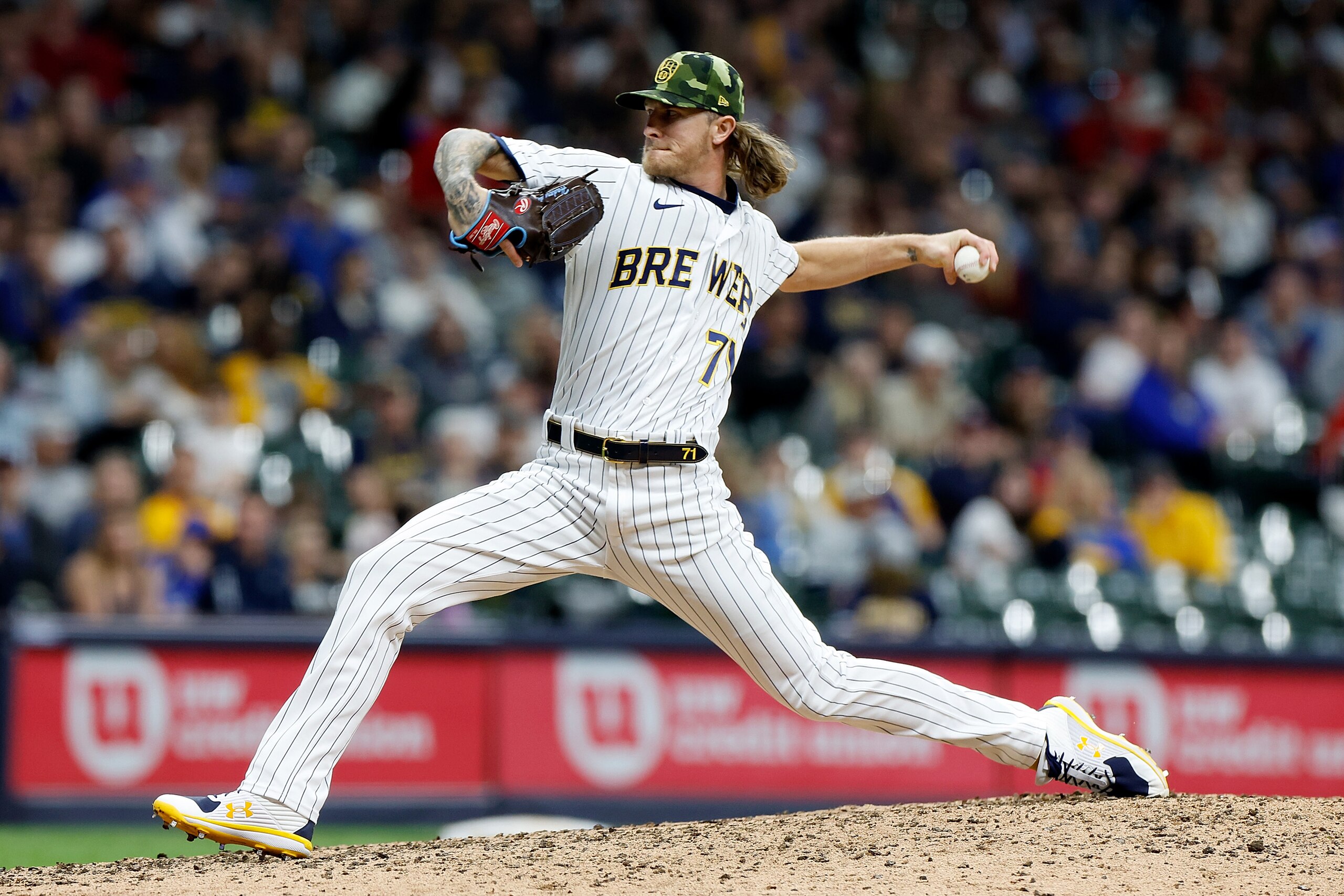 MILWAUKEE, WISCONSIN - MAY 21: Josh Hader #71 of the Milwaukee Brewers throws a pitch in the ninth inning against the Washington Nationals  at American Family Field on May 21, 2022 in Milwaukee, Wisconsin. (Photo by John Fisher/Getty Images)