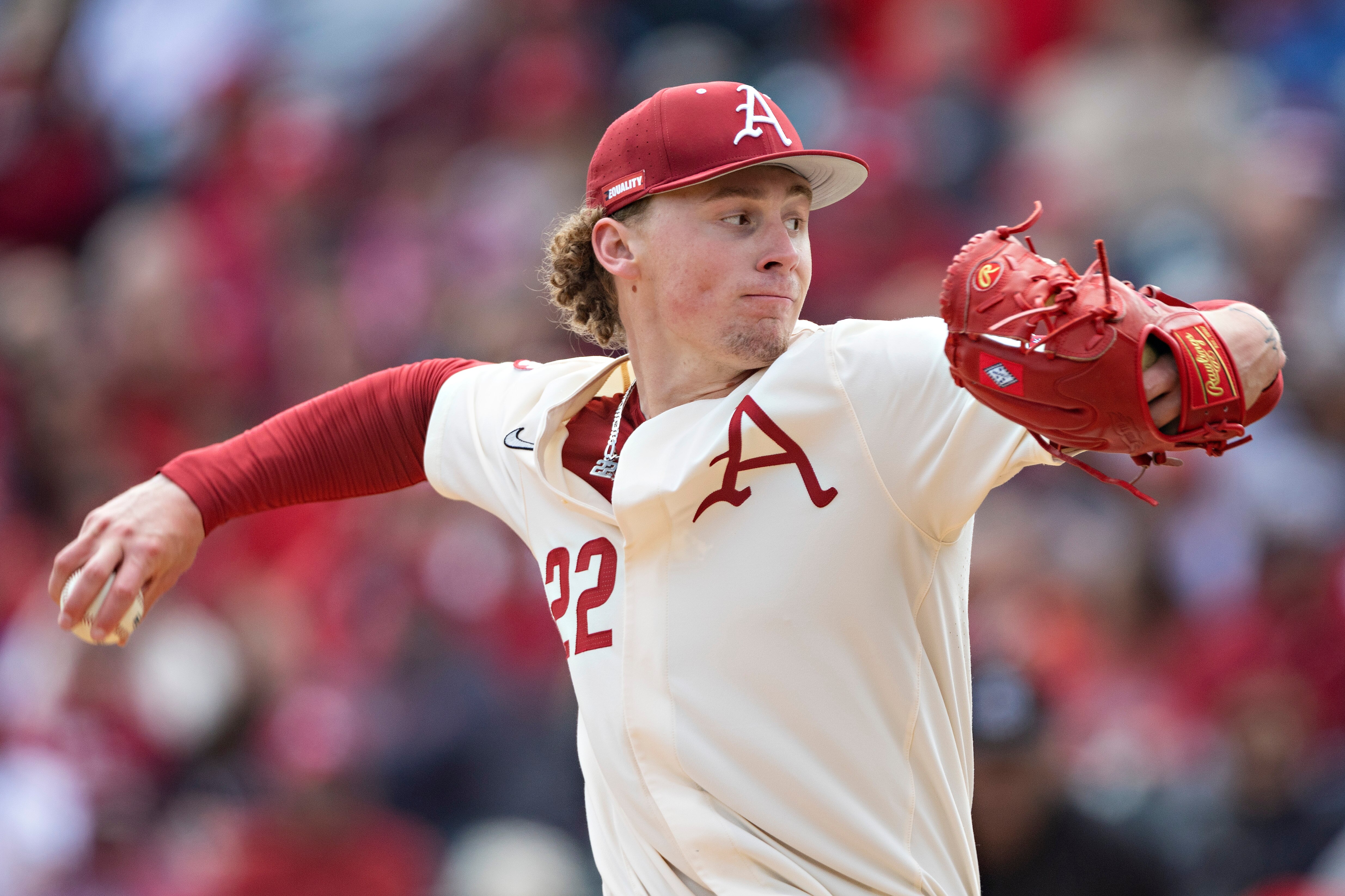 FAYETTEVILLE, ARKANSAS - APRIL 16: Jsxon Wiggins #22 of the Arkansas Razorbacks pitches during a game against the LSU Tigers at Baum-Walker Stadium at George Cole Field on April 16, 2022 in Fayetteville, Arkansas. The Razorbacks defeated the Tigers 6-2. (Photo by Wesley Hitt/Getty Images)