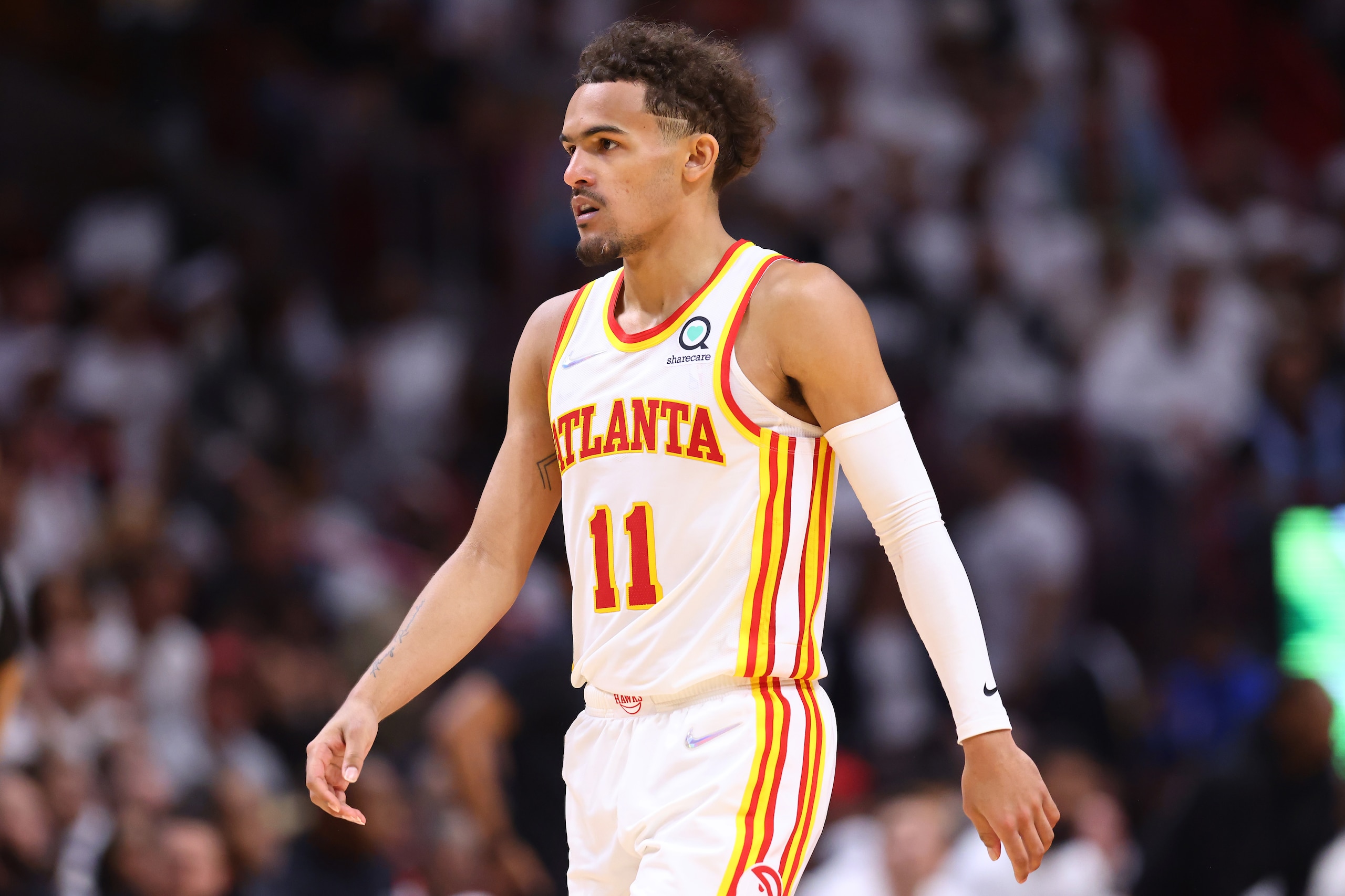 MIAMI, FLORIDA - APRIL 26: Trae Young #11 of the Atlanta Hawks reacts against the Miami Heat in Game Five of the Eastern Conference First Round at FTX Arena on April 26, 2022 in Miami, Florida. NOTE TO USER: User expressly acknowledges and agrees that, by downloading and or using this photograph, User is consenting to the terms and conditions of the Getty Images License Agreement. (Photo by Michael Reaves/Getty Images) MIAMI, FLORIDA - APRIL 26: Trae Young #11 of the Atlanta Hawks reacts against the Miami Heat in Game Five of the Eastern Conference First Round at FTX Arena on April 26, 2022 in Miami, Florida. NOTE TO USER: User expressly acknowledges and agrees that, by downloading and or using this photograph, User is consenting to the terms and conditions of the Getty Images License Agreement. (Photo by Michael Reaves/Getty Images)