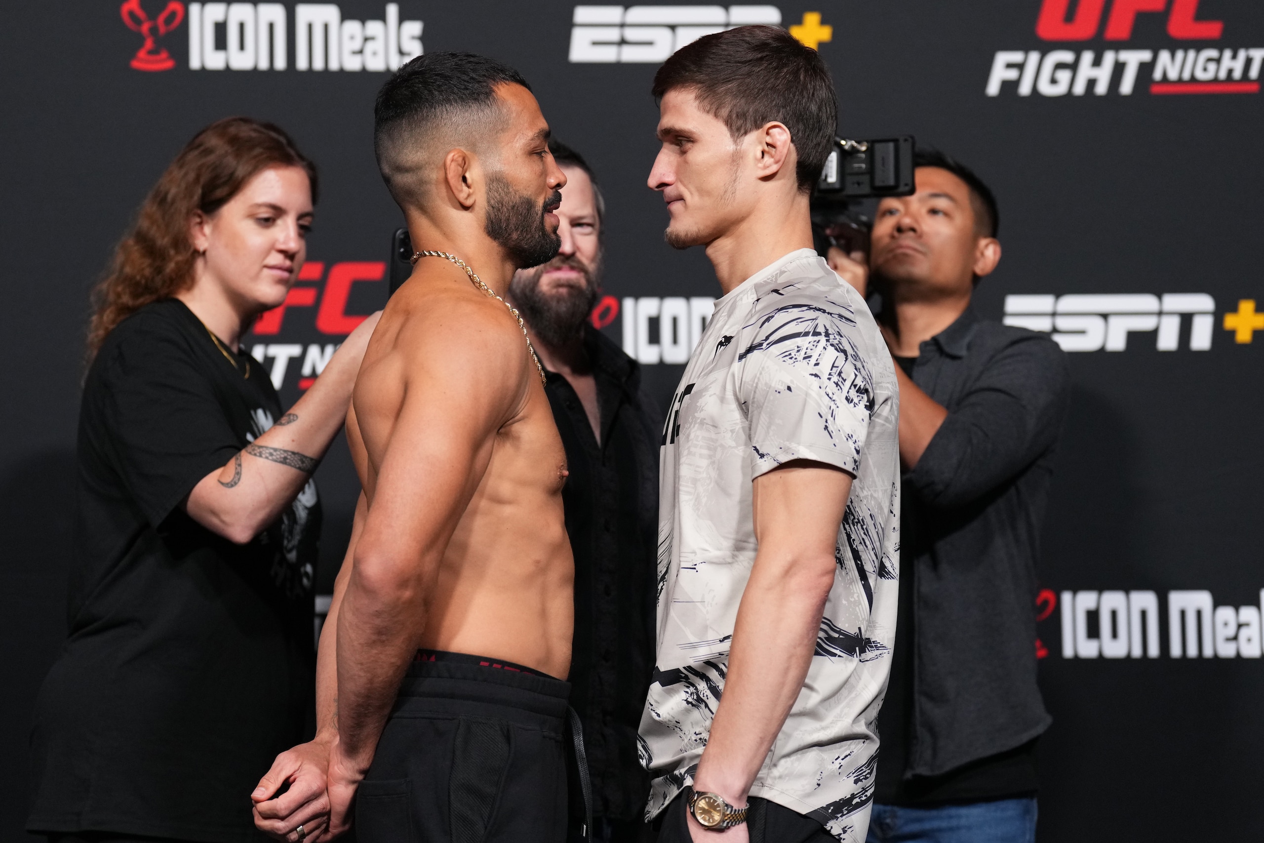 LAS VEGAS, NEVADA - JUNE 03: (L-R) Opponents Dan Ige and Movsar Evloev of Russia face off during the UFC Fight Night weigh-in at UFC APEX on June 03, 2022 in Las Vegas, Nevada. (Photo by Chris Unger/Zuffa LLC)
