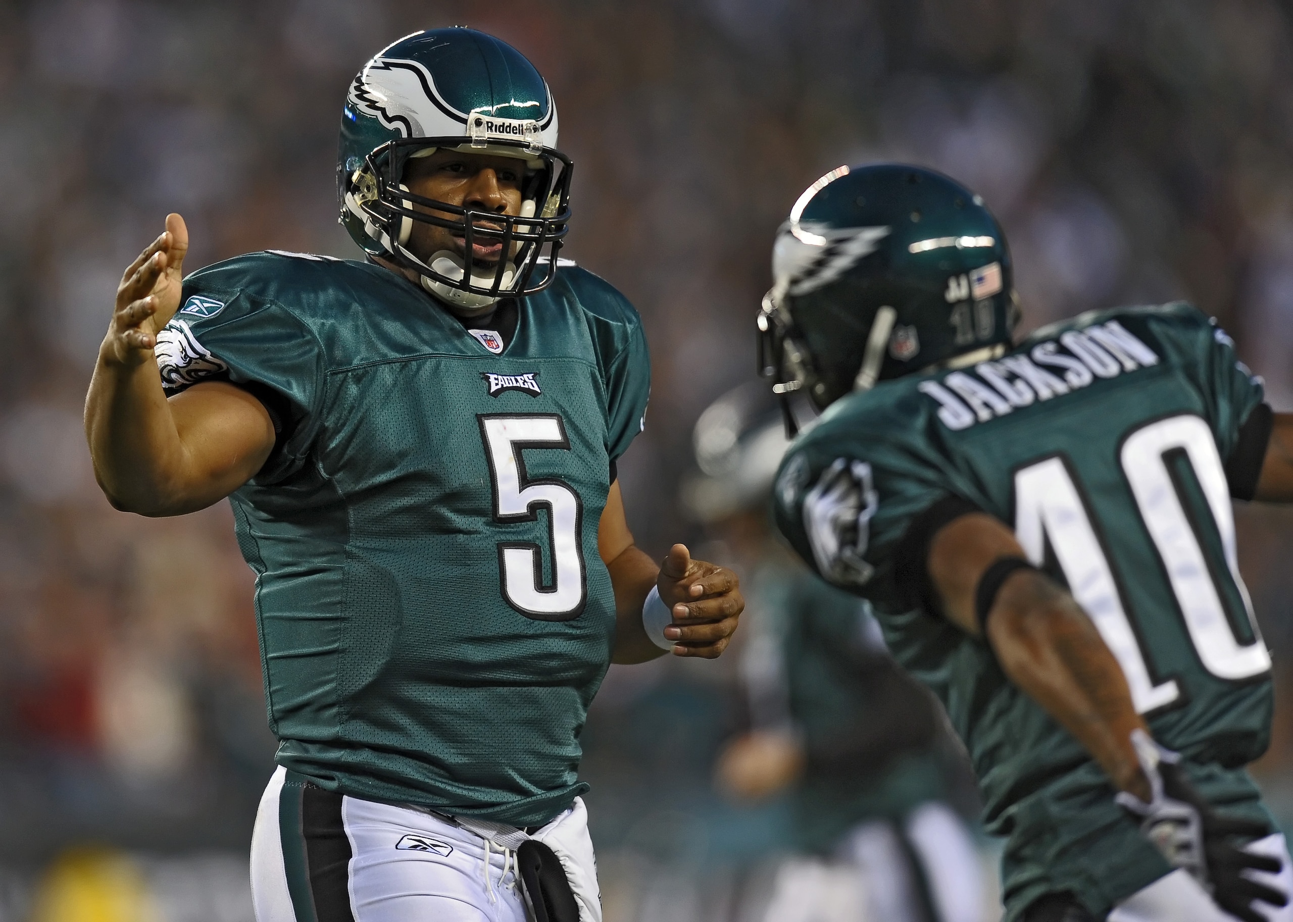 PHILADELPHIA - DECEMBER 27: Quarterback Donovan McNabb #5 and wide receiver DeSean Jackson #10 of the Philadelphia Eagles celebrate Jackson's touchdown reception during the game against the Denver Broncos on December 27, 2009 at Lincoln Financial Field in Philadelphia, Pennsylvania. The Eagles won 30-27.  (Photo by Drew Hallowell/Getty Images)