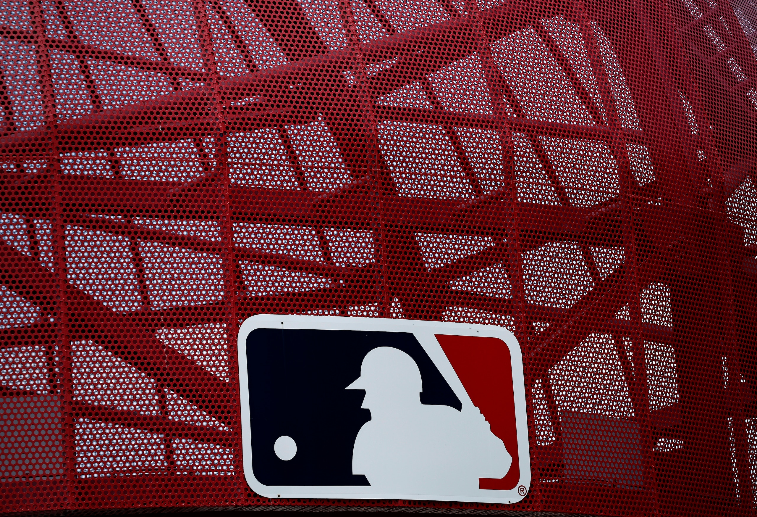 ANAHEIM, CALIFORNIA - MAY 22:  A MLB logo is seen before a game between the Oakland Athletics and the Los Angeles Angels at Angel Stadium of Anaheim on May 22, 2022 in Anaheim, California. (Photo by Ronald Martinez/Getty Images)