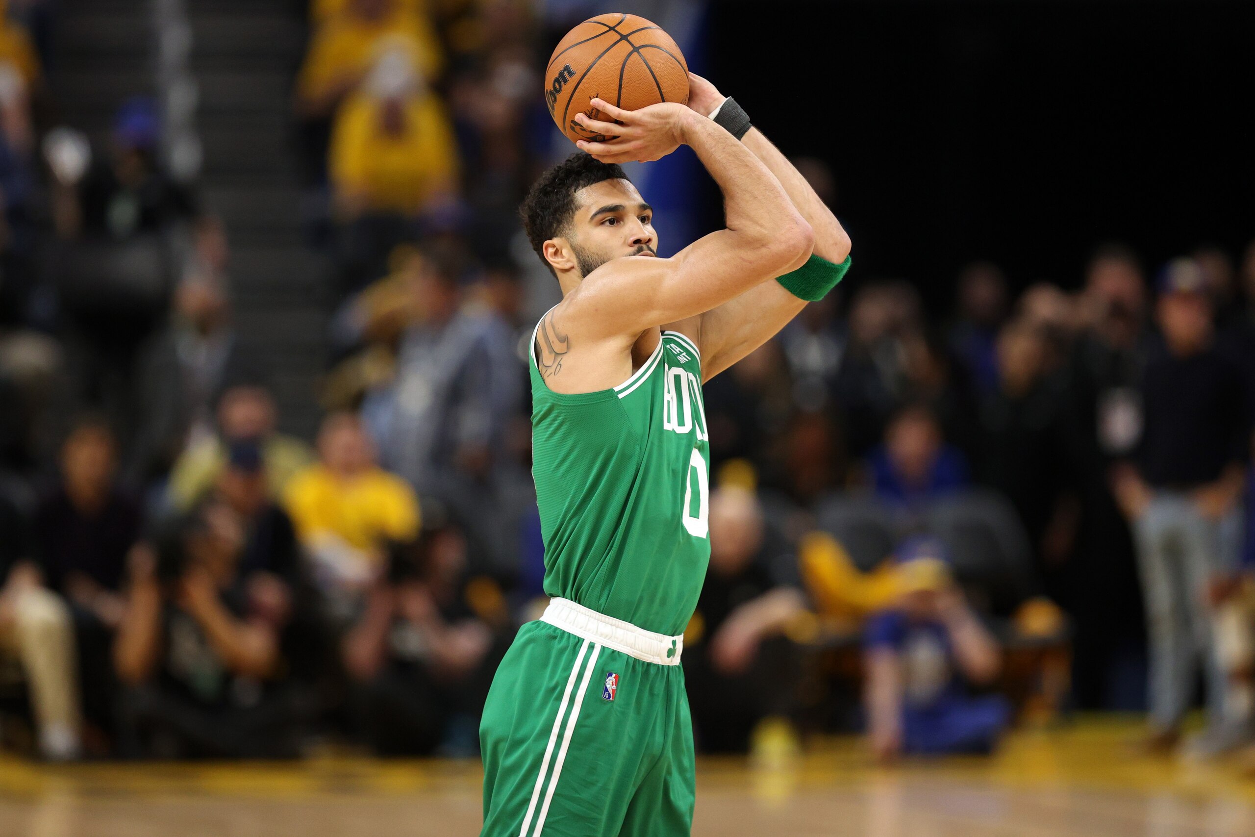 SAN FRANCISCO, CALIFORNIA - JUNE 02: Jayson Tatum #0 of the Boston Celtics shoots the ball against the Golden State Warriors during the third quarter in Game One of the 2022 NBA Finals at Chase Center on June 02, 2022 in San Francisco, California. NOTE TO USER: User expressly acknowledges and agrees that, by downloading and/or using this photograph, User is consenting to the terms and conditions of the Getty Images License Agreement. (Photo by Ezra Shaw/Getty Images)