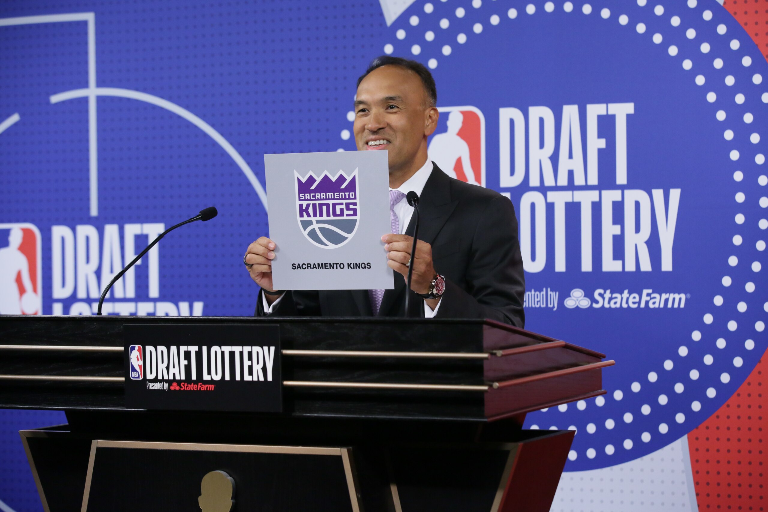 SECAUCUS, NJ - JUNE 22: Deputy Commissioner of the NBA, Mark Tatum holds up the card of the Sacramento Kings after they get the 9th overall pick in the NBA Draft during the 2021 NBA Draft Lottery on June 22, 2021 at the NBA Entertainment Studios in Secaucus, New Jersey. NOTE TO USER: User expressly acknowledges and agrees that, by downloading and/or using this photograph, user is consenting to the terms and conditions of the Getty Images License Agreement. Mandatory Copyright Notice: Copyright 2021 NBAE (Photo by Steve Freeman/NBAE via Getty Images)