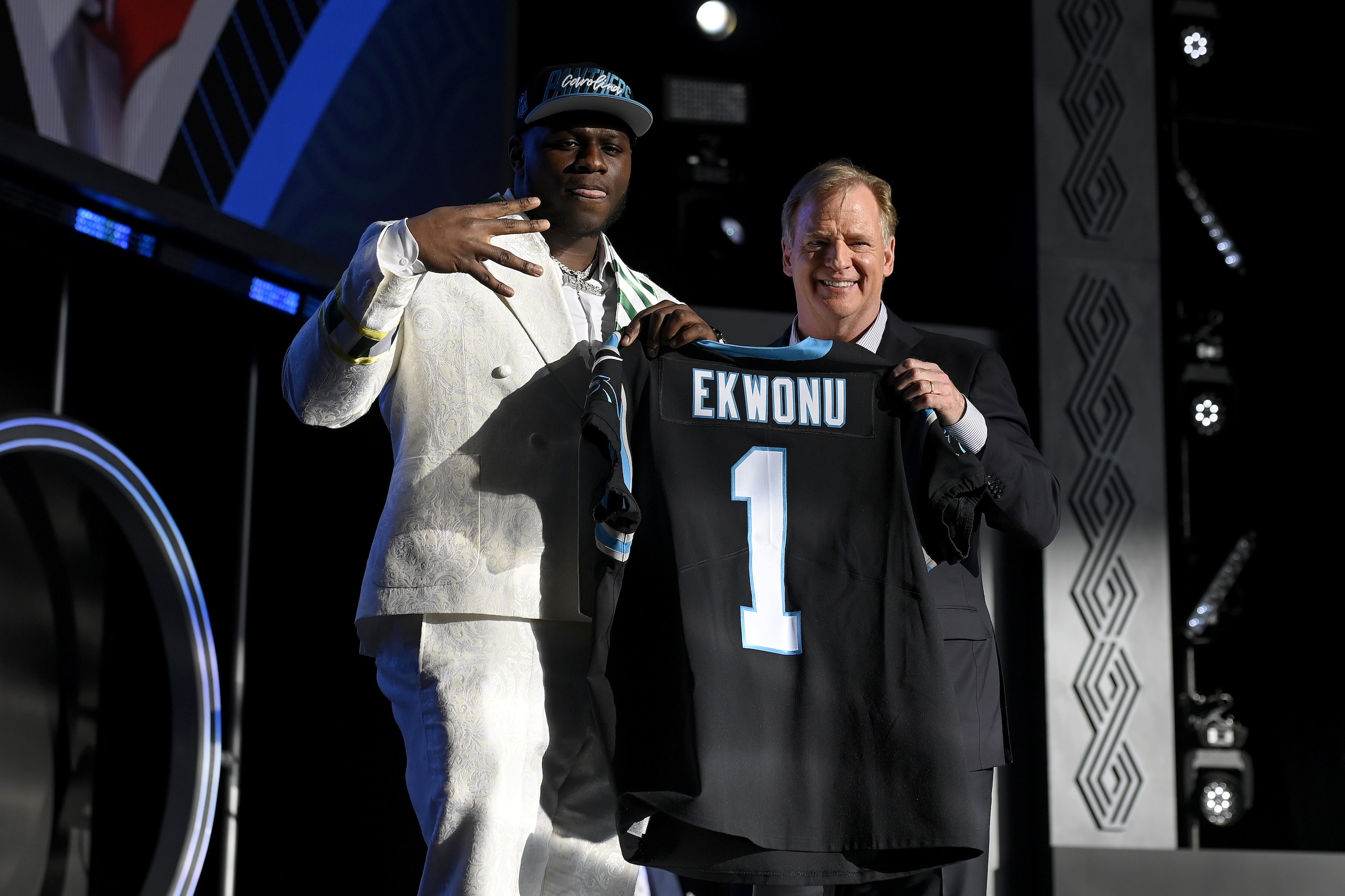 LAS VEGAS, NEVADA - APRIL 28: (L-R) Ikem Ekwonu poses with NFL Commissioner Roger Goodell onstage after being selected sixth by the Carolina Panthers during round one of the 2022 NFL Draft on April 28, 2022 in Las Vegas, Nevada. (Photo by David Becker/Getty Images) LAS VEGAS, NEVADA - APRIL 28: (L-R) Ikem Ekwonu poses with NFL Commissioner Roger Goodell onstage after being selected sixth by the Carolina Panthers during round one of the 2022 NFL Draft on April 28, 2022 in Las Vegas, Nevada. (Photo by David Becker/Getty Images)