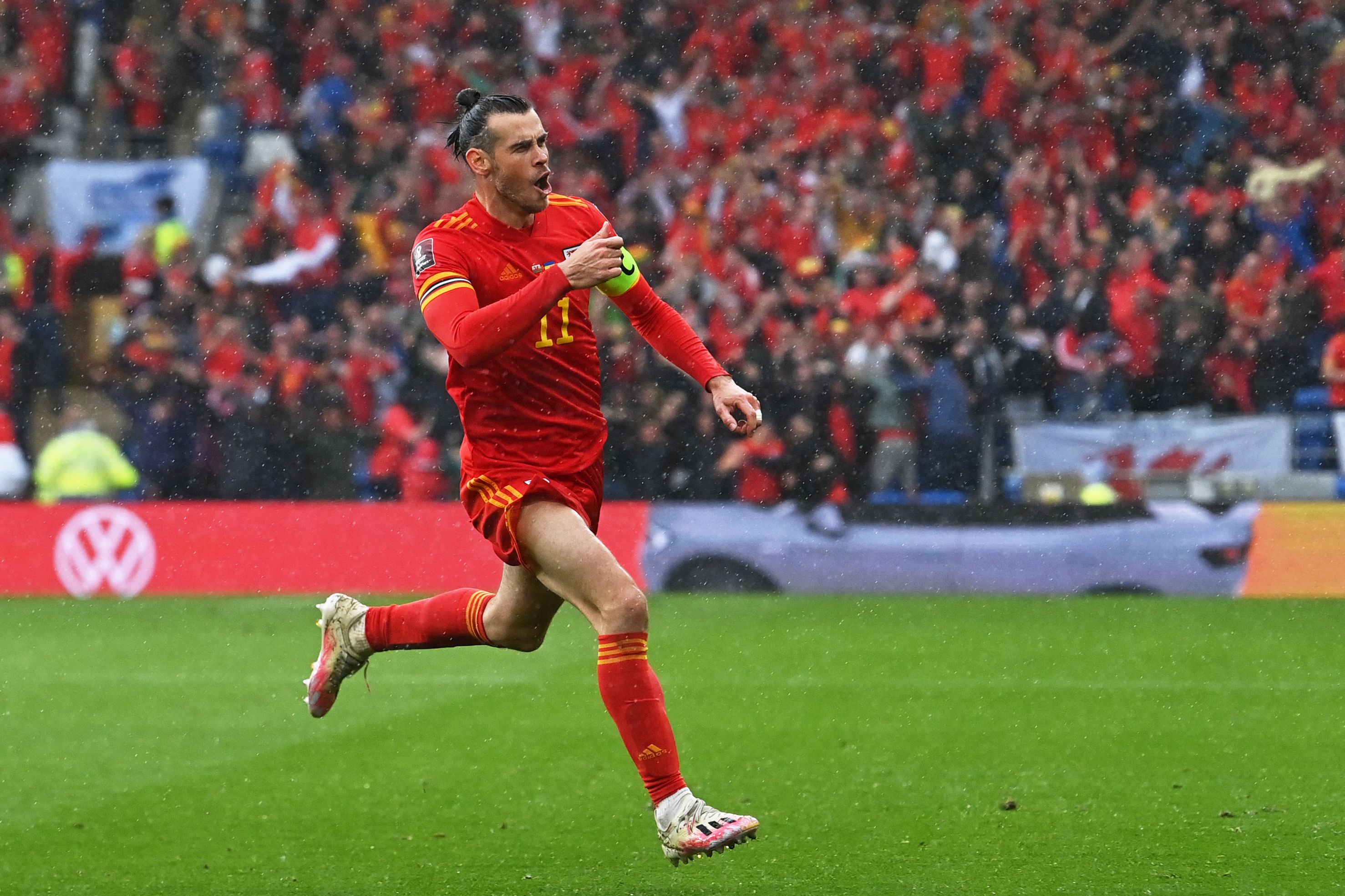 Wales' striker Gareth Bale celebrates after scoring the opening goal during the FIFA World Cup 2022 play-off final qualifier football match between Wales and Ukraine at the Cardiff City Stadium in Cardiff, south Wales, on June 5, 2022. (Photo by Paul ELLIS / AFP) (Photo by PAUL ELLIS/AFP via Getty Images)