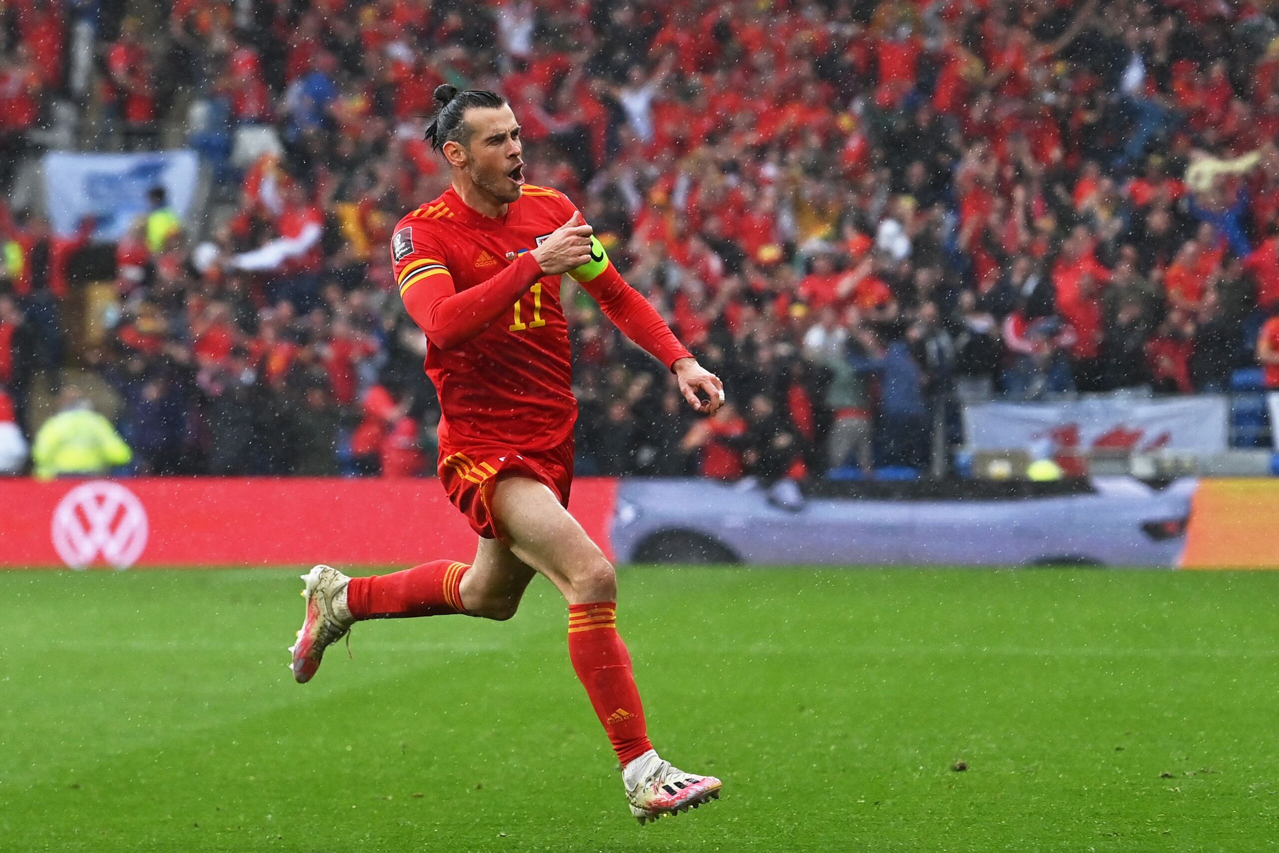 Wales' striker Gareth Bale celebrates after scoring the opening goal during the FIFA World Cup 2022 play-off final qualifier football match between Wales and Ukraine at the Cardiff City Stadium in Cardiff, south Wales, on June 5, 2022. (Photo by Paul ELLIS / AFP) (Photo by PAUL ELLIS/AFP via Getty Images) Wales' striker Gareth Bale celebrates after scoring the opening goal during the FIFA World Cup 2022 play-off final qualifier football match between Wales and Ukraine at the Cardiff City Stadium in Cardiff, south Wales, on June 5, 2022. (Photo by Paul ELLIS / AFP) (Photo by PAUL ELLIS/AFP via Getty Images)