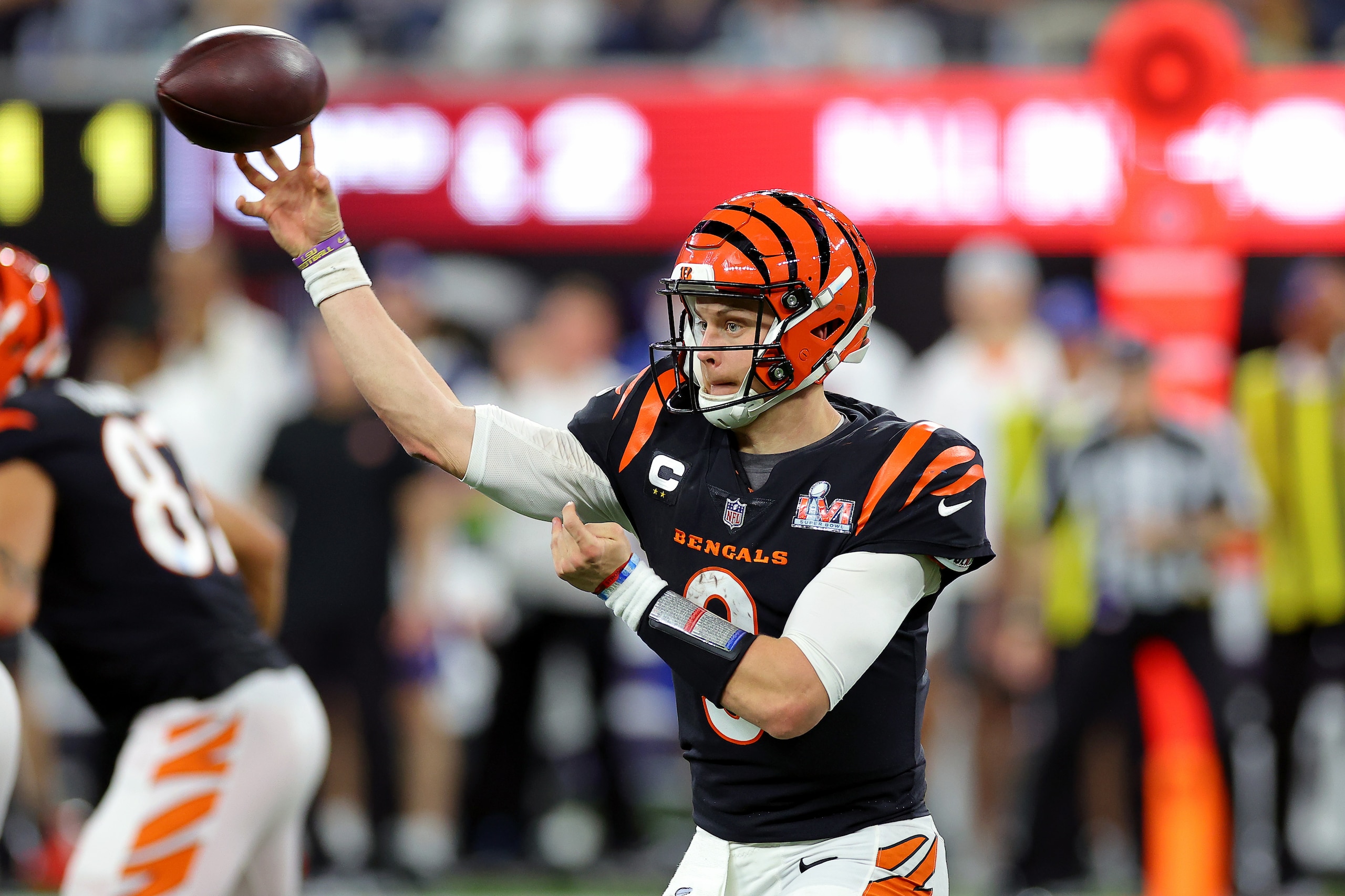 INGLEWOOD, CALIFORNIA - FEBRUARY 13:Joe Burrow #9 of the Cincinnati Bengals throws a pass during the first half of Super Bowl LVI against the Los Angeles Rams at SoFi Stadium on February 13, 2022 in Inglewood, California. (Photo by Kevin C. Cox/Getty Images)
