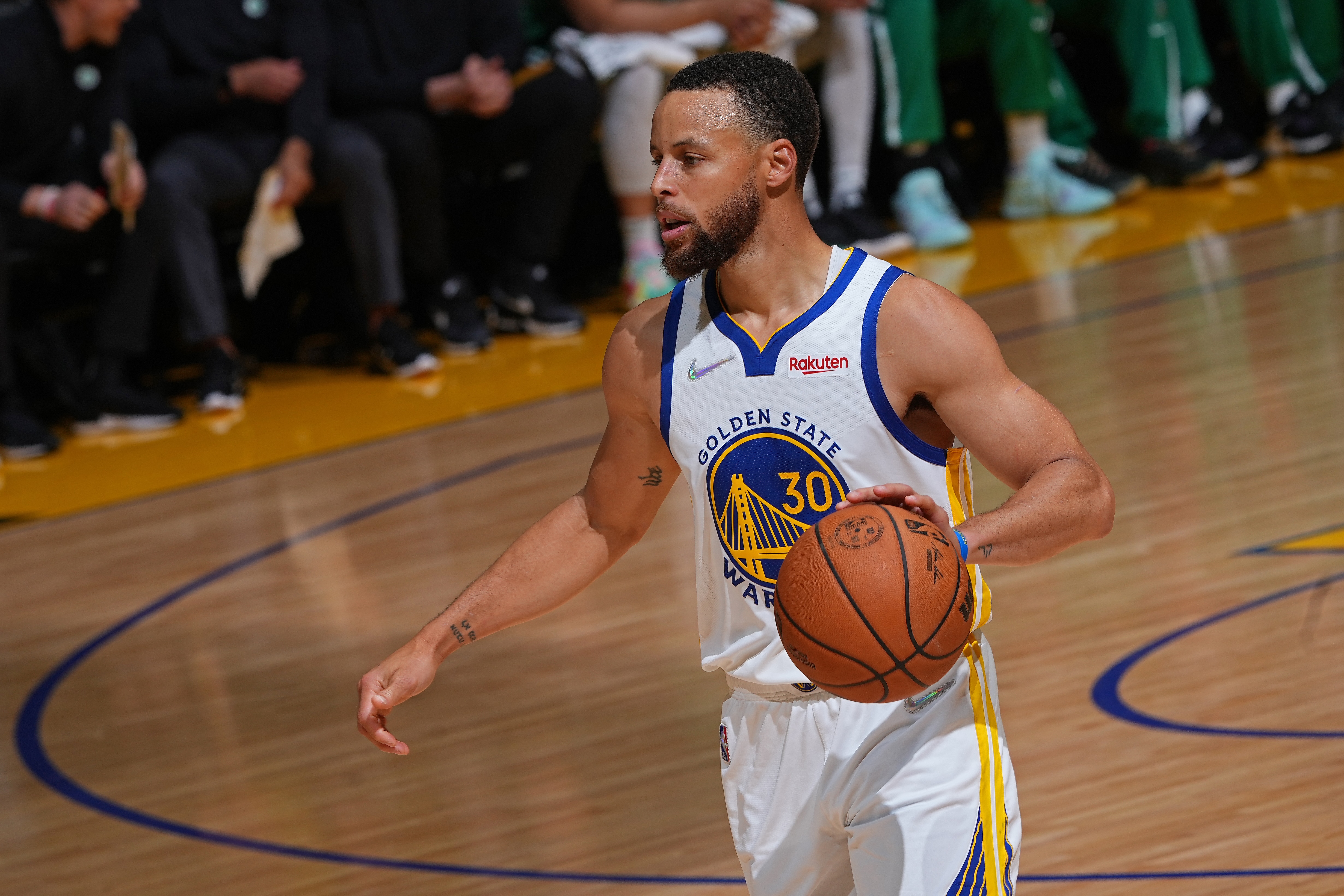 SAN FRANCISCO, CA - JUNE 5: Stephen Curry #30 of the Golden State Warriors dribbles the ball against the Boston Celtics during Game Two of the 2022 NBA Finals on June 5, 2022 at Chase Center in San Francisco, California. NOTE TO USER: User expressly acknowledges and agrees that, by downloading and or using this photograph, user is consenting to the terms and conditions of Getty Images License Agreement. Mandatory Copyright Notice: Copyright 2022 NBAE (Photo by Garrett Ellwood/NBAE via Getty Images)