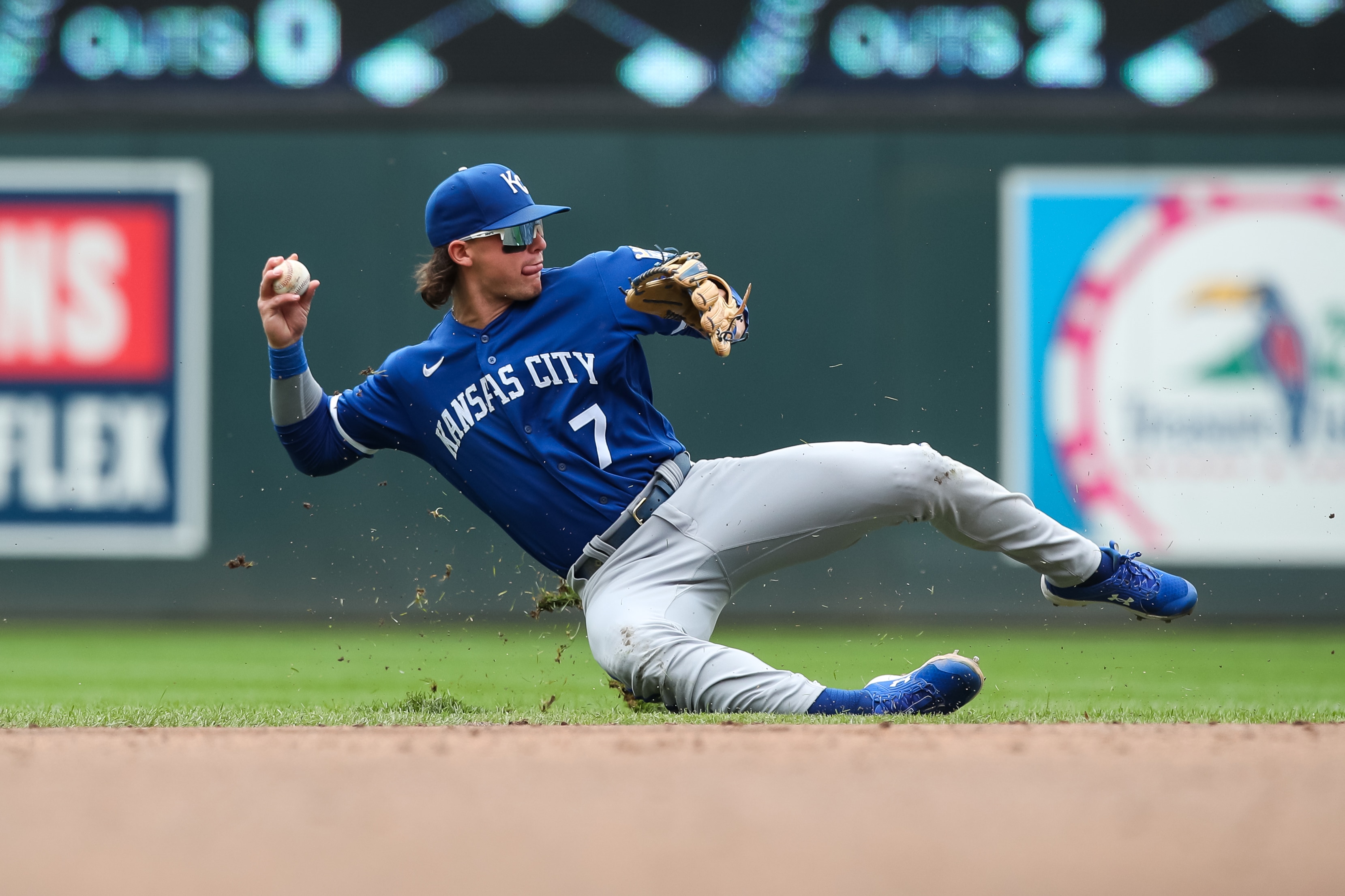 MINNEAPOLIS, MN - MAY 29: Bobby Witt Jr. #7 of the Kansas City Royals throws the ball to first base on an infield single by Byron Buxton #25 of the Minnesota Twins in the third inning of the game at Target Field on May 29, 2022 in Minneapolis, Minnesota. (Photo by David Berding/Getty Images)