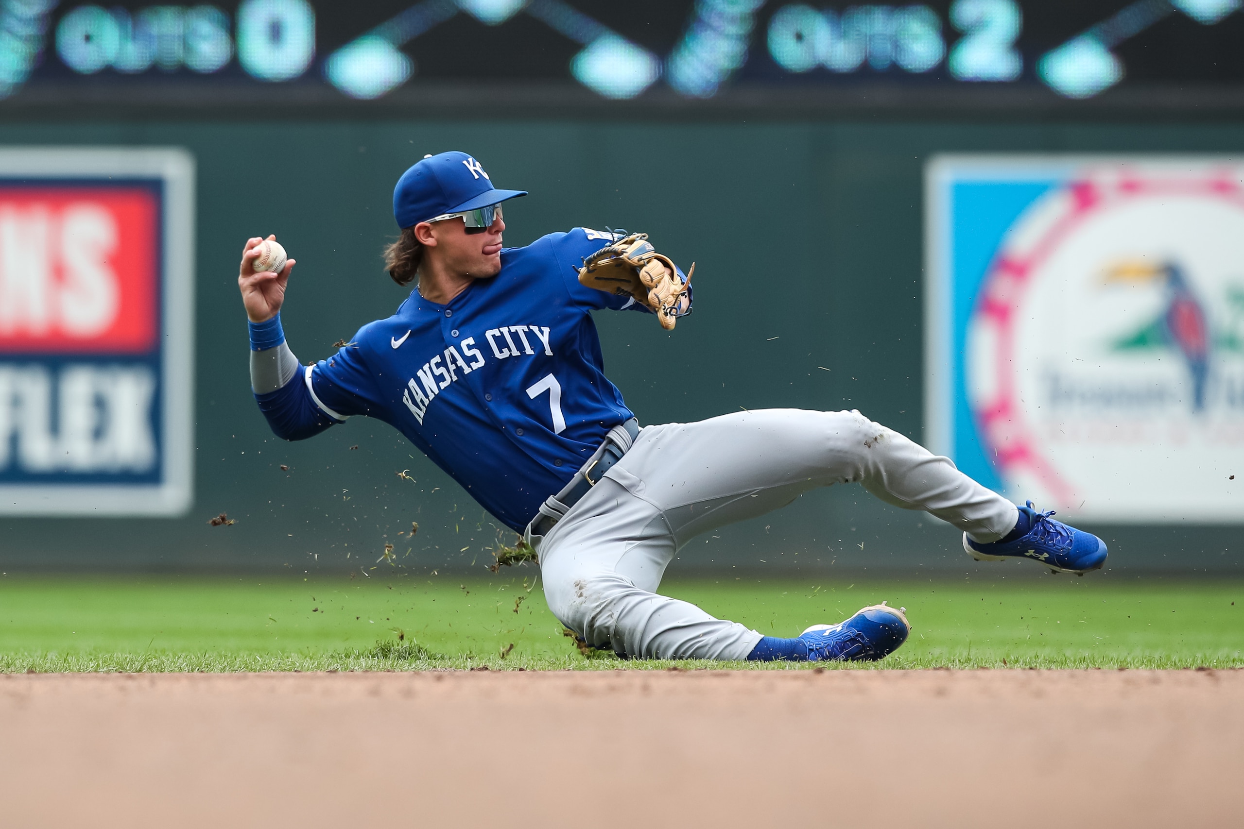 MINNEAPOLIS, MN - MAY 29: Bobby Witt Jr. #7 of the Kansas City Royals throws the ball to first base on an infield single by Byron Buxton #25 of the Minnesota Twins in the third inning of the game at Target Field on May 29, 2022 in Minneapolis, Minnesota. (Photo by David Berding/Getty Images) MINNEAPOLIS, MN - MAY 29: Bobby Witt Jr. #7 of the Kansas City Royals throws the ball to first base on an infield single by Byron Buxton #25 of the Minnesota Twins in the third inning of the game at Target Field on May 29, 2022 in Minneapolis, Minnesota. (Photo by David Berding/Getty Images)