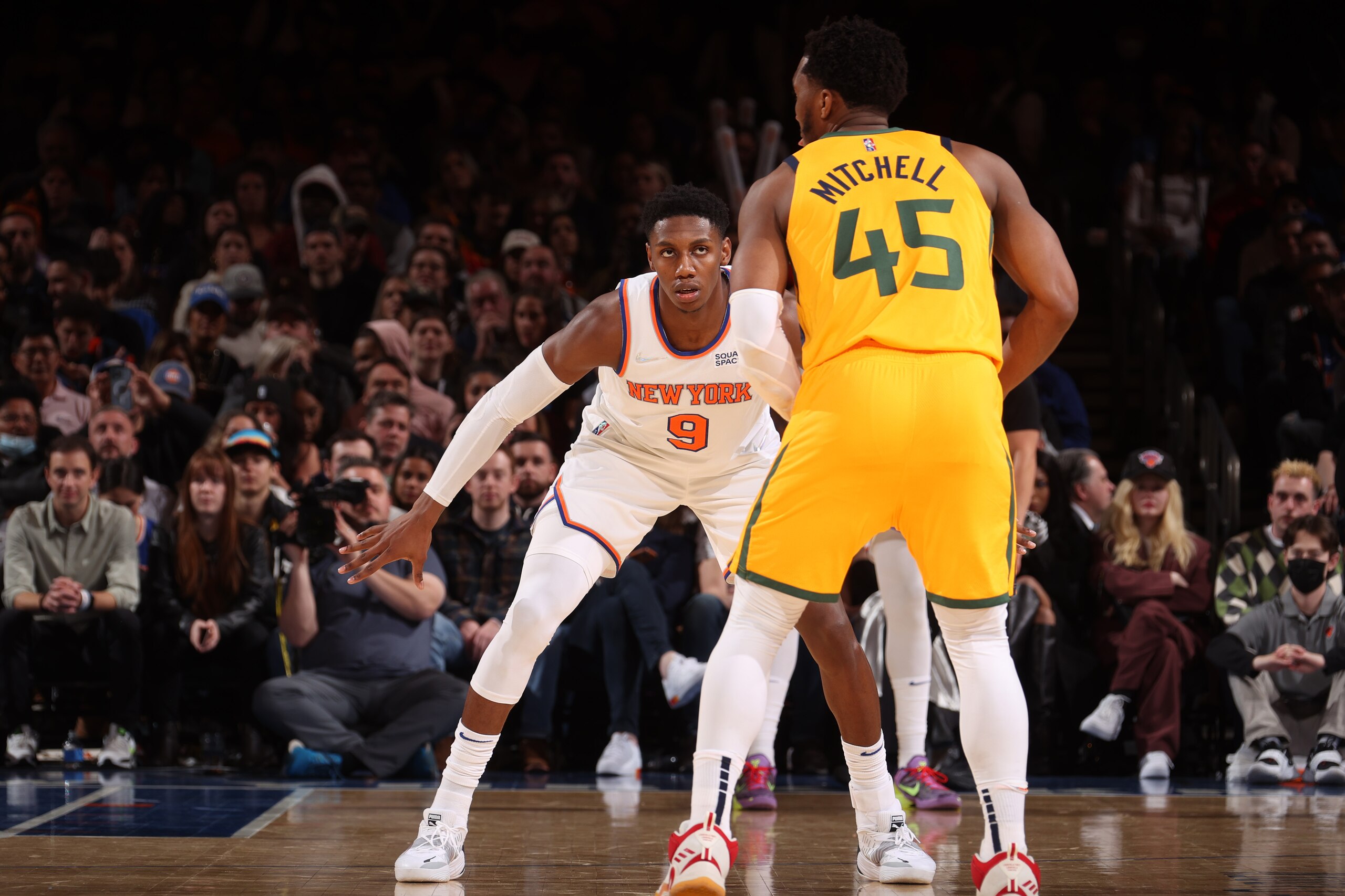 NEW YORK, NY - MARCH 20: RJ Barrett #9 of the New York Knicks plays defense on Donovan Mitchell #45 of the Utah Jazz during the game on March 20, 2022 at Madison Square Garden in New York City, New York. NOTE TO USER: User expressly acknowledges and agrees that, by downloading and or using this photograph, User is consenting to the terms and conditions of the Getty Images License Agreement. Mandatory Copyright Notice: Copyright 2022 NBAE (Photo by Nathaniel S. Butler/NBAE via Getty Images) NEW YORK, NY - MARCH 20: RJ Barrett #9 of the New York Knicks plays defense on Donovan Mitchell #45 of the Utah Jazz during the game on March 20, 2022 at Madison Square Garden in New York City, New York. NOTE TO USER: User expressly acknowledges and agrees that, by downloading and or using this photograph, User is consenting to the terms and conditions of the Getty Images License Agreement. Mandatory Copyright Notice: Copyright 2022 NBAE (Photo by Nathaniel S. Butler/NBAE via Getty Images)
