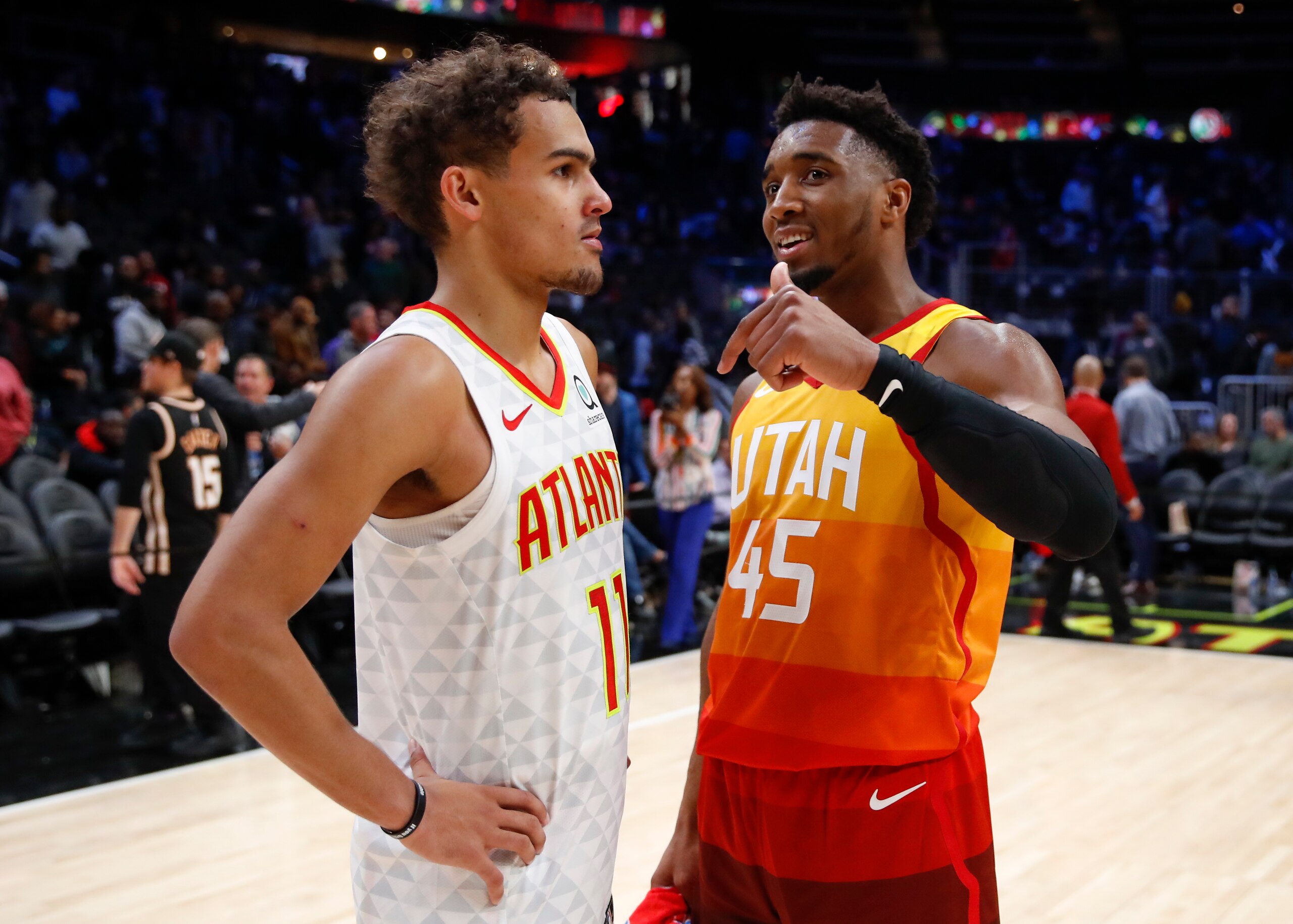 ATLANTA, GA - DECEMBER 19: Donovan Mitchell #45 of the Utah Jazz speaks with Trae Young #11 of the Atlanta Hawks at the conclusion of an NBA game at State Farm Arena on December 19, 2019 in Atlanta, Georgia. NOTE TO USER: User expressly acknowledges and agrees that, by downloading and/or using this photograph, user is consenting to the terms and conditions of the Getty Images License Agreement. (Photo by Todd Kirkland/Getty Images) ATLANTA, GA - DECEMBER 19: Donovan Mitchell #45 of the Utah Jazz speaks with Trae Young #11 of the Atlanta Hawks at the conclusion of an NBA game at State Farm Arena on December 19, 2019 in Atlanta, Georgia. NOTE TO USER: User expressly acknowledges and agrees that, by downloading and/or using this photograph, user is consenting to the terms and conditions of the Getty Images License Agreement. (Photo by Todd Kirkland/Getty Images)