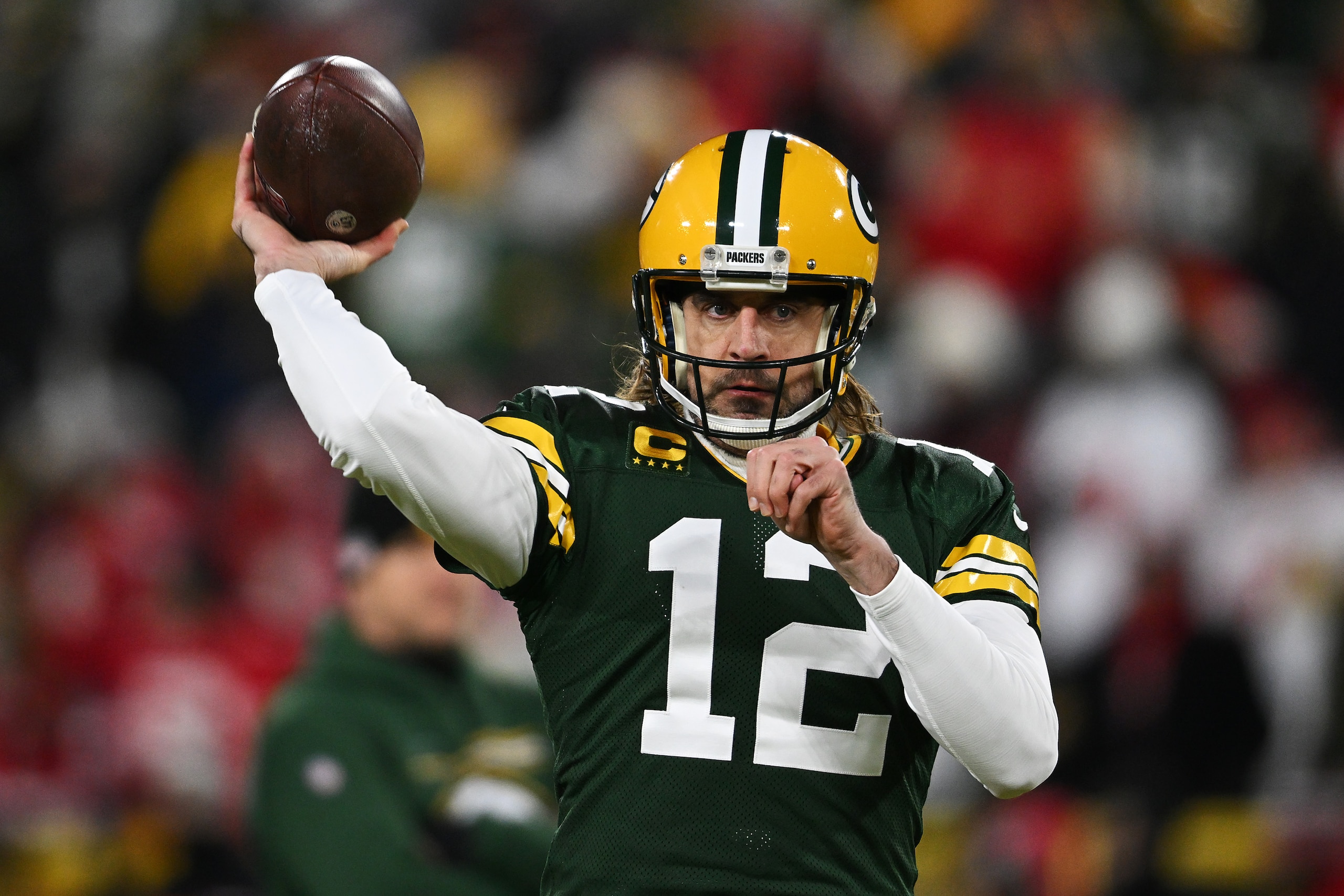 GREEN BAY, WISCONSIN - JANUARY 22: Quarterback Aaron Rodgers #12 of the Green Bay Packers warms up prior to the NFC Divisional Playoff game against the San Francisco 49ers at Lambeau Field on January 22, 2022 in Green Bay, Wisconsin. (Photo by Quinn Harris/Getty Images) GREEN BAY, WISCONSIN - JANUARY 22: Quarterback Aaron Rodgers #12 of the Green Bay Packers warms up prior to the NFC Divisional Playoff game against the San Francisco 49ers at Lambeau Field on January 22, 2022 in Green Bay, Wisconsin. (Photo by Quinn Harris/Getty Images)