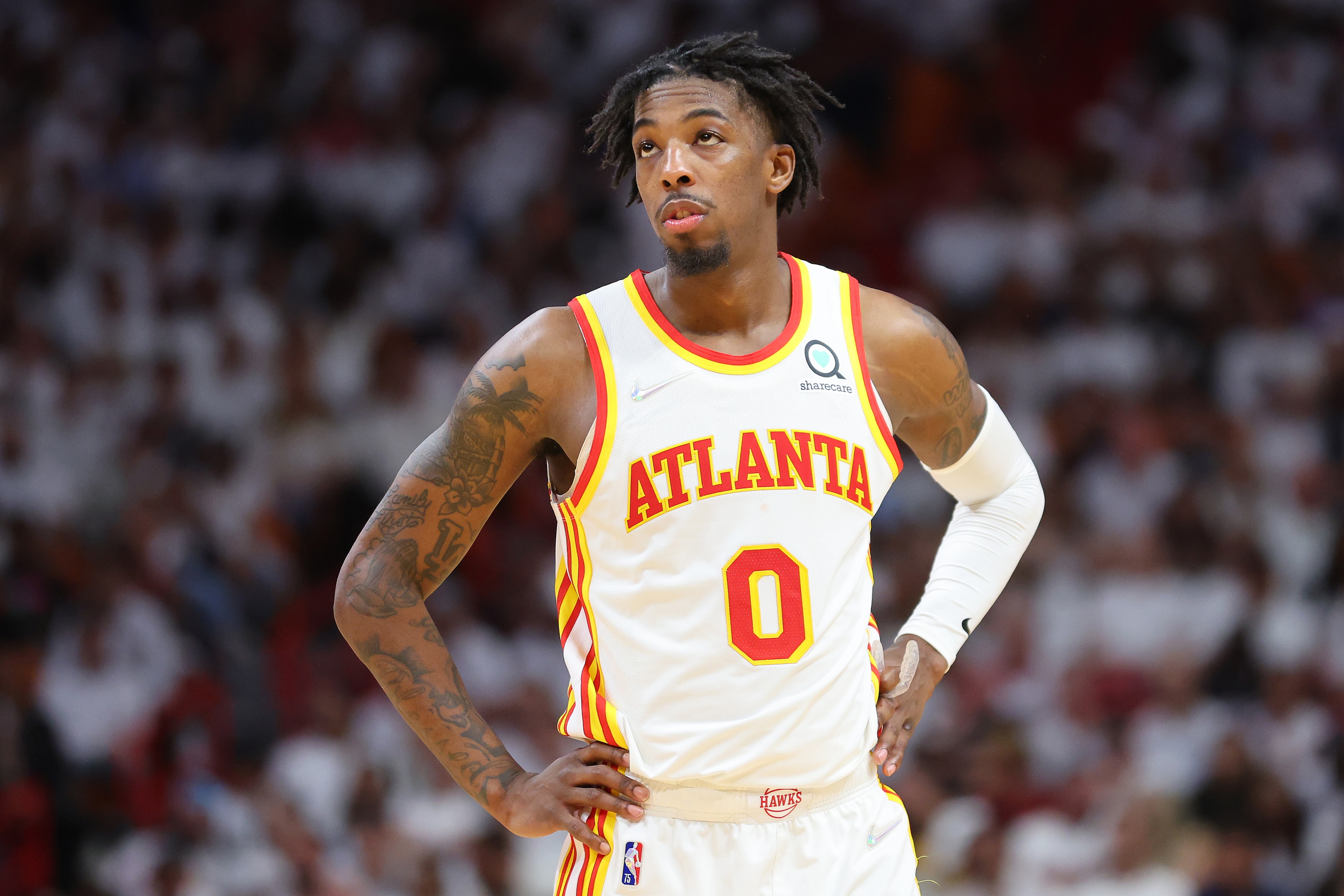 MIAMI, FLORIDA - APRIL 26: Delon Wright #0 of the Atlanta Hawks reacts against the Miami Heat in Game Five of the Eastern Conference First Round at FTX Arena on April 26, 2022 in Miami, Florida. NOTE TO USER: User expressly acknowledges and agrees that, by downloading and or using this photograph, User is consenting to the terms and conditions of the Getty Images License Agreement.  (Photo by Michael Reaves/Getty Images)