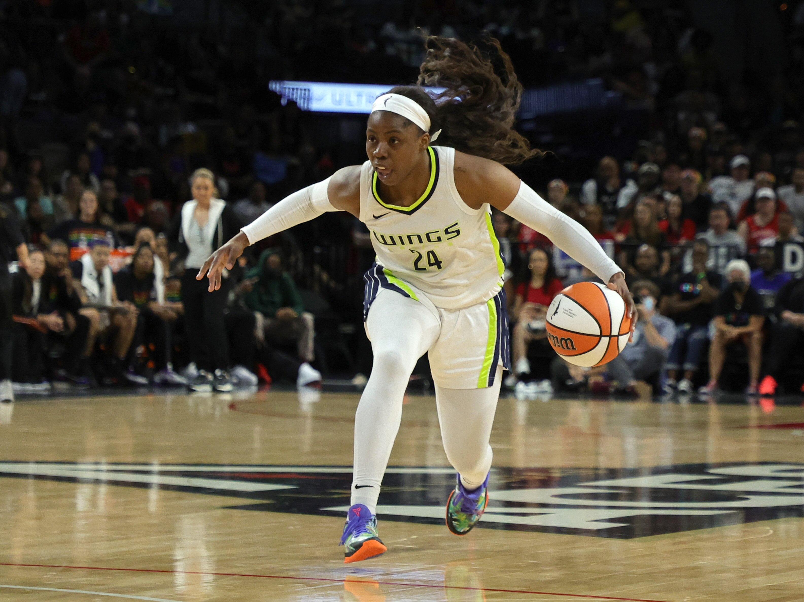 LAS VEGAS, NEVADA - JUNE 05: Arike Ogunbowale #24 of the Dallas Wings brings the ball up the court against the Las Vegas Aces during their game at Michelob ULTRA Arena on June 05, 2022 in Las Vegas, Nevada. The Aces defeated the Wings 84-78. NOTE TO USER: User expressly acknowledges and agrees that, by downloading and or using this photograph, User is consenting to the terms and conditions of the Getty Images License Agreement. (Photo by Ethan Miller/Getty Images)