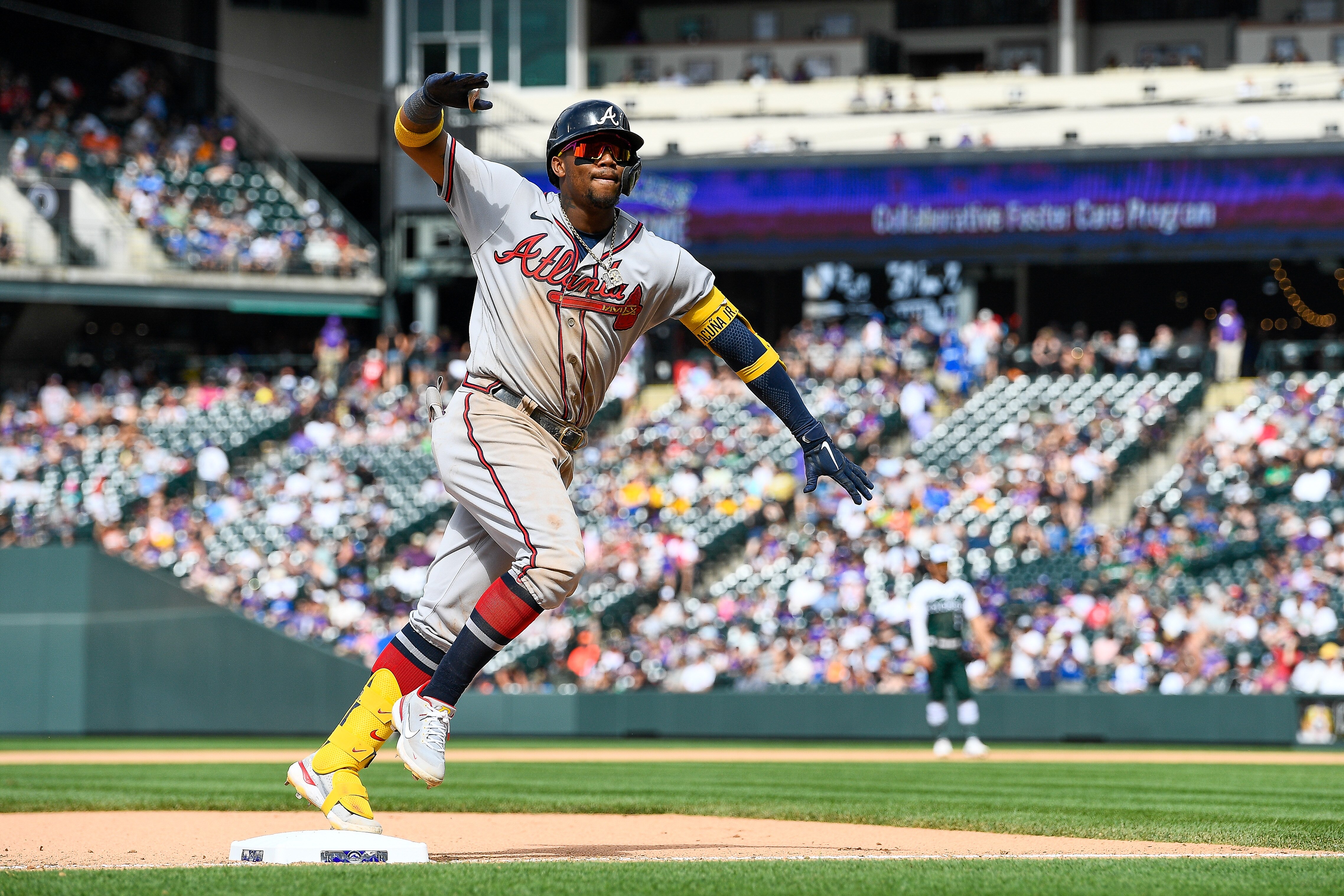 DENVER, CO - JUNE 5: Ronald Acuna Jr. #13 of the Atlanta Braves rounds the bases after hitting an eighth inning solo home run against the Colorado Rockies at Coors Field on June 5, 2022 in Denver, Colorado. (Photo by Dustin Bradford/Getty Images)