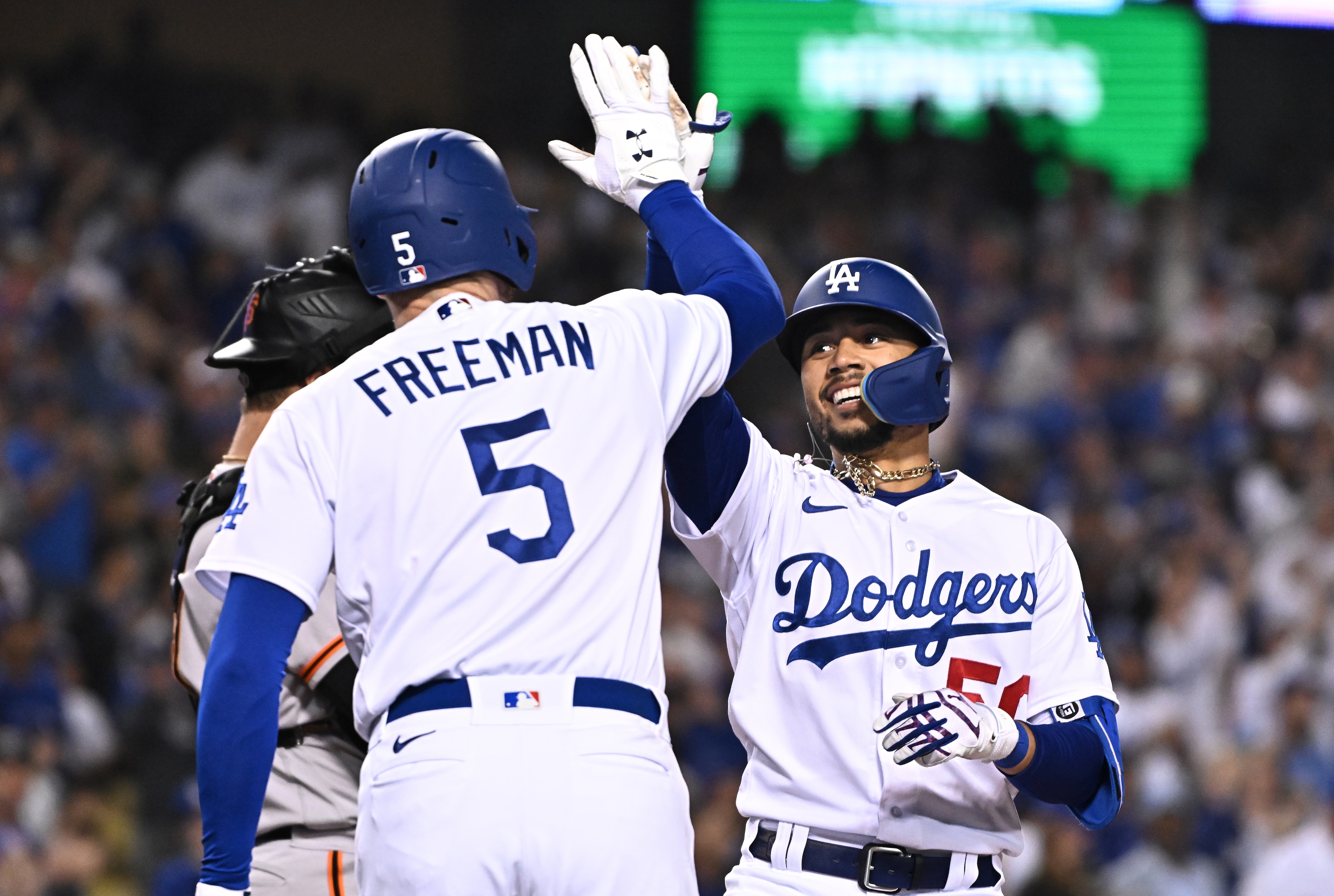 Los Angeles, California May 4, 2022-Dodgers Mookie Betts celebrates his solo home run against the Giants with Freddie Freeman in the sixth inning at Dodger Stadium Wednesday. (Wally Skalij/Los Angeles Times via Getty Images)